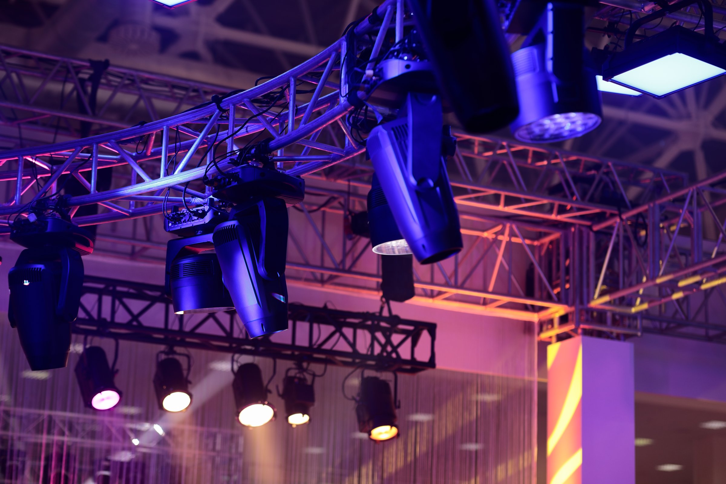 Lighting truss structures and professional stage light fixtures. Selective focus.