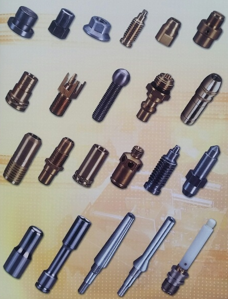 Assorted metal fasteners and components displayed on a yellow background, including bolts, nuts, and connectors.