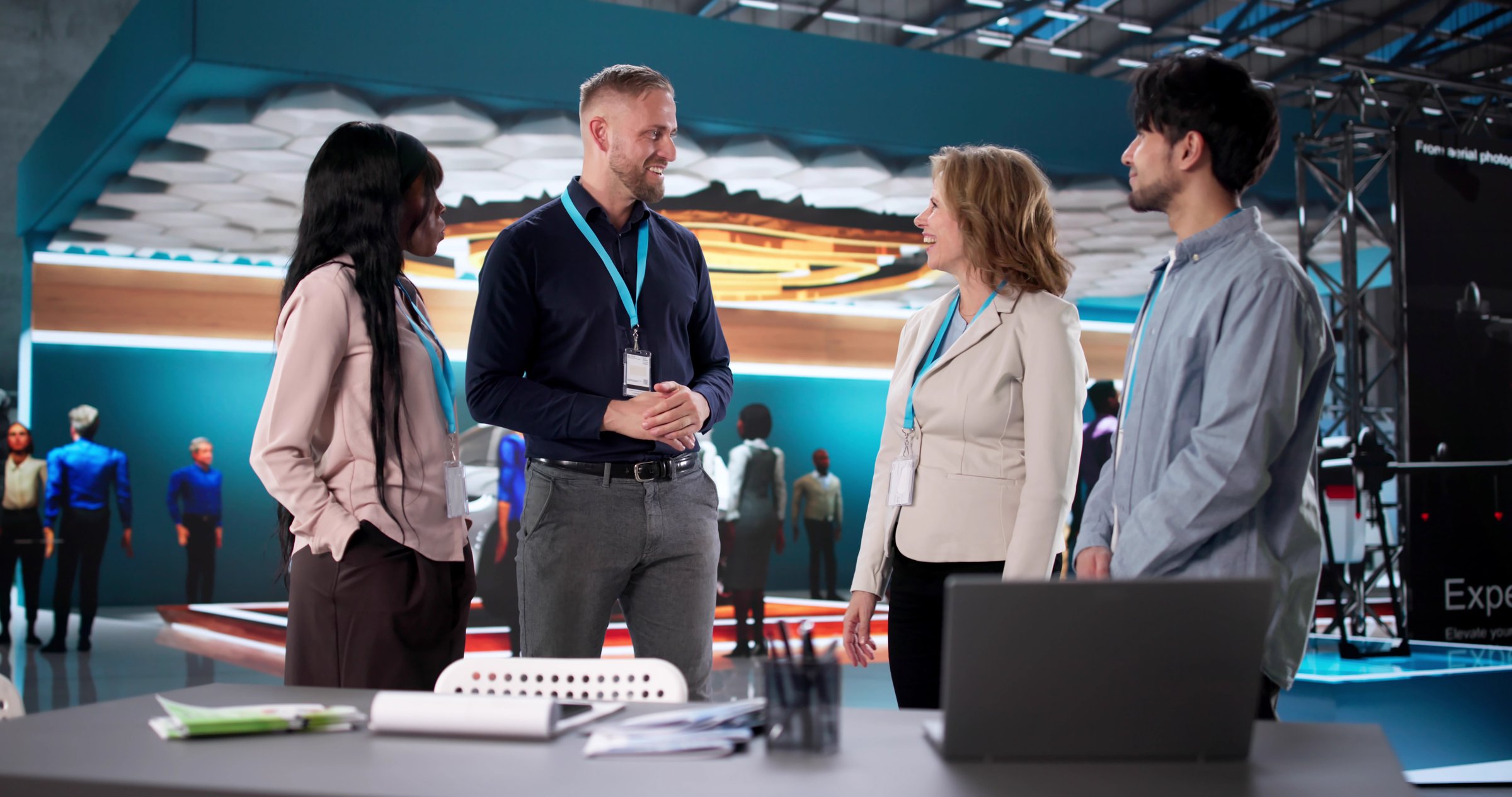 Leadership Seminar Featuring Diverse International Corporate Team At Trade Fair.