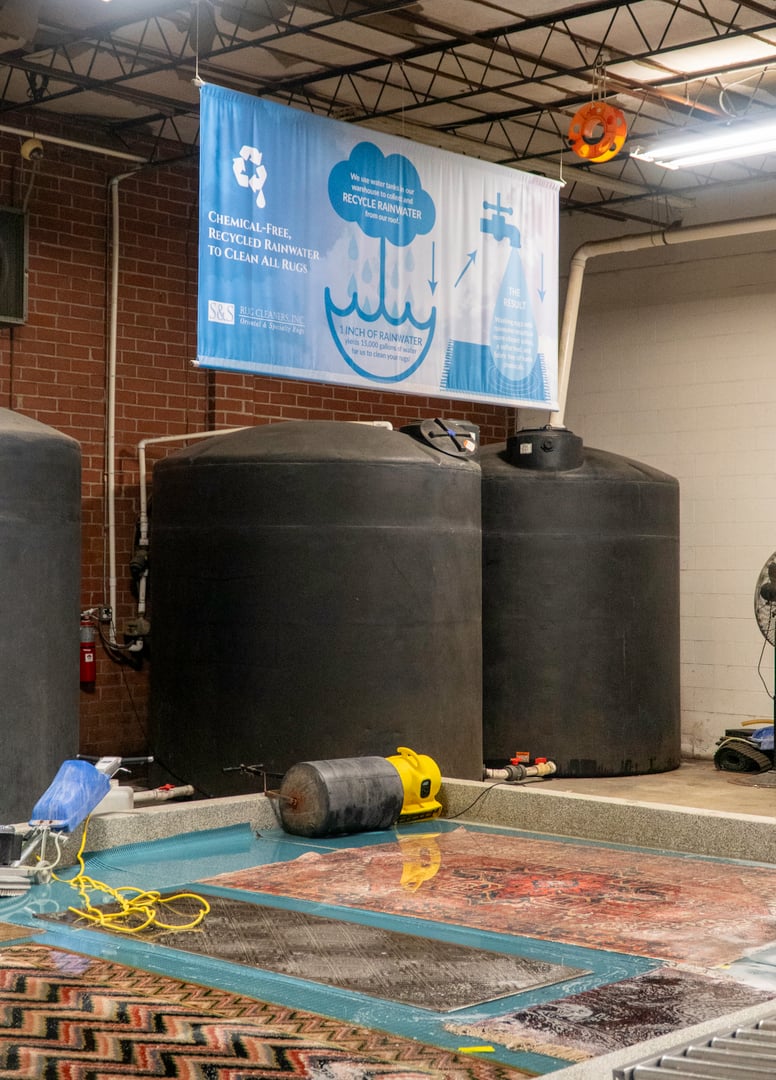 Rainwater harvesting system tanks used for green rug cleaning services at S&S Rug Cleaners Atlanta