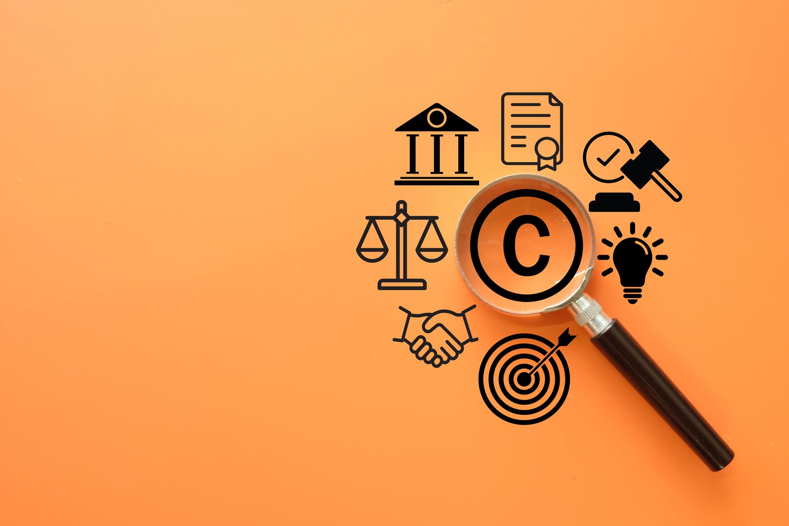 Copyright and intellectual property law concept. A magnifying glass focuses on the copyright symbol surrounded by icons of justice, contracts, and patents for the legal protection of creative work.