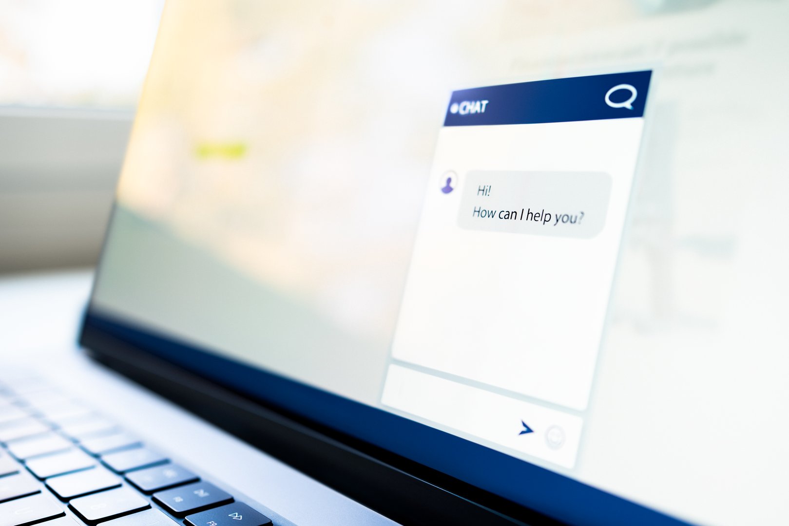Chat with customer. AI chatbot. Support contact help center website on laptop computer screen. Live helpdesk service with bot or human. Online conversation with agent. Automated message.