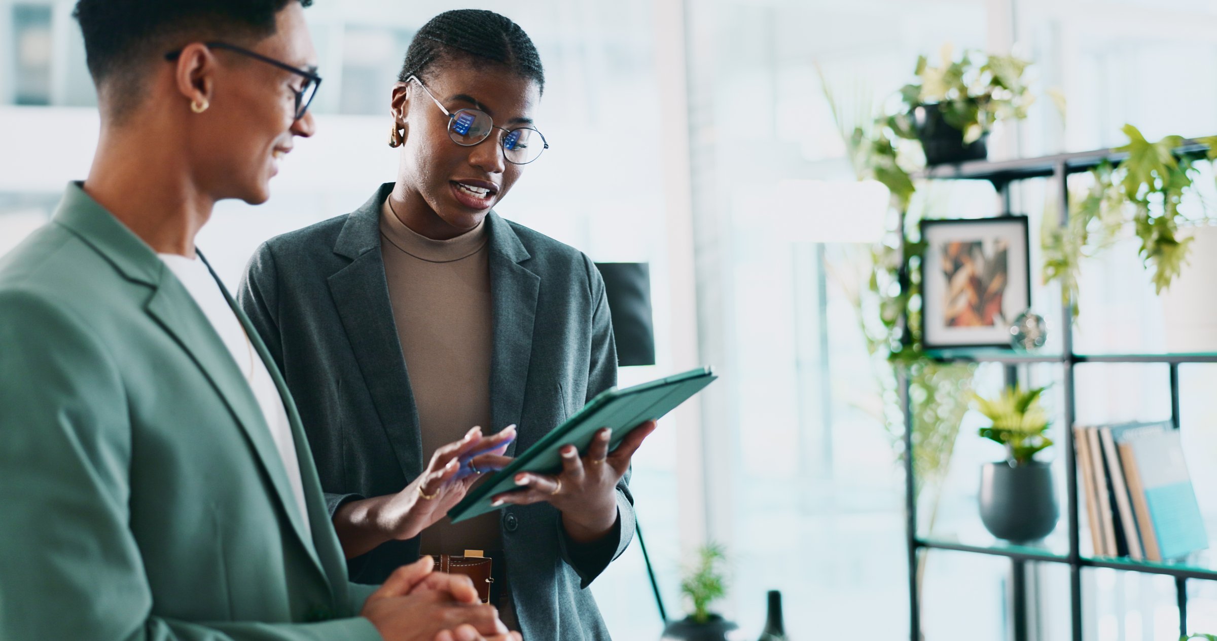 Teamwork, consultant and tablet with business people in office for sustainability manager, eco research and planning. Environment policy, climate change solution and discussion with employees