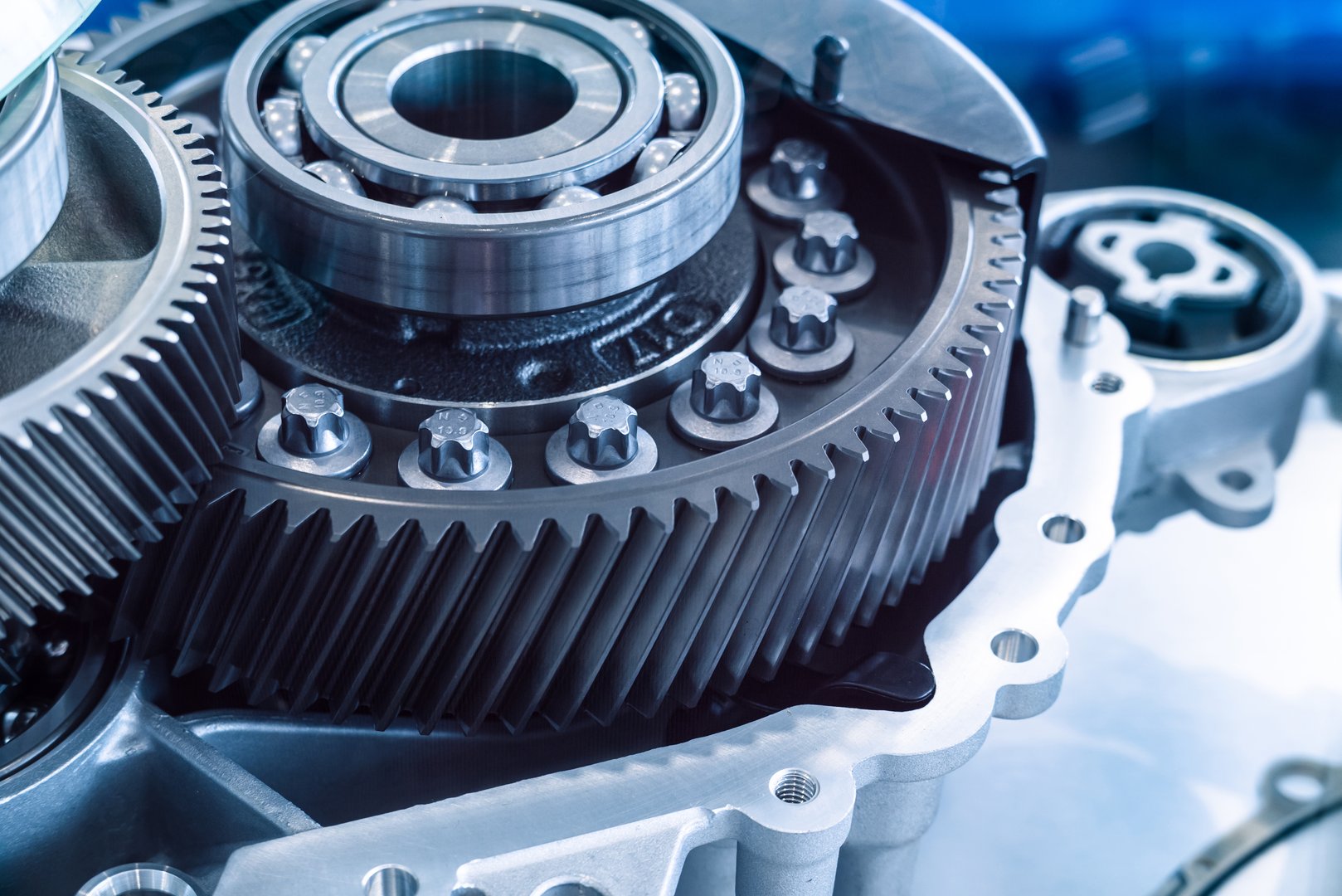 Gear set of driving motor in EV car. Roller bearings. new bearing for electric motor.