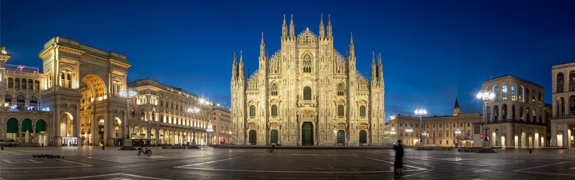 Milan - The Piazza del Duomo square with the westfacade of Duomo - cathedral at dusk