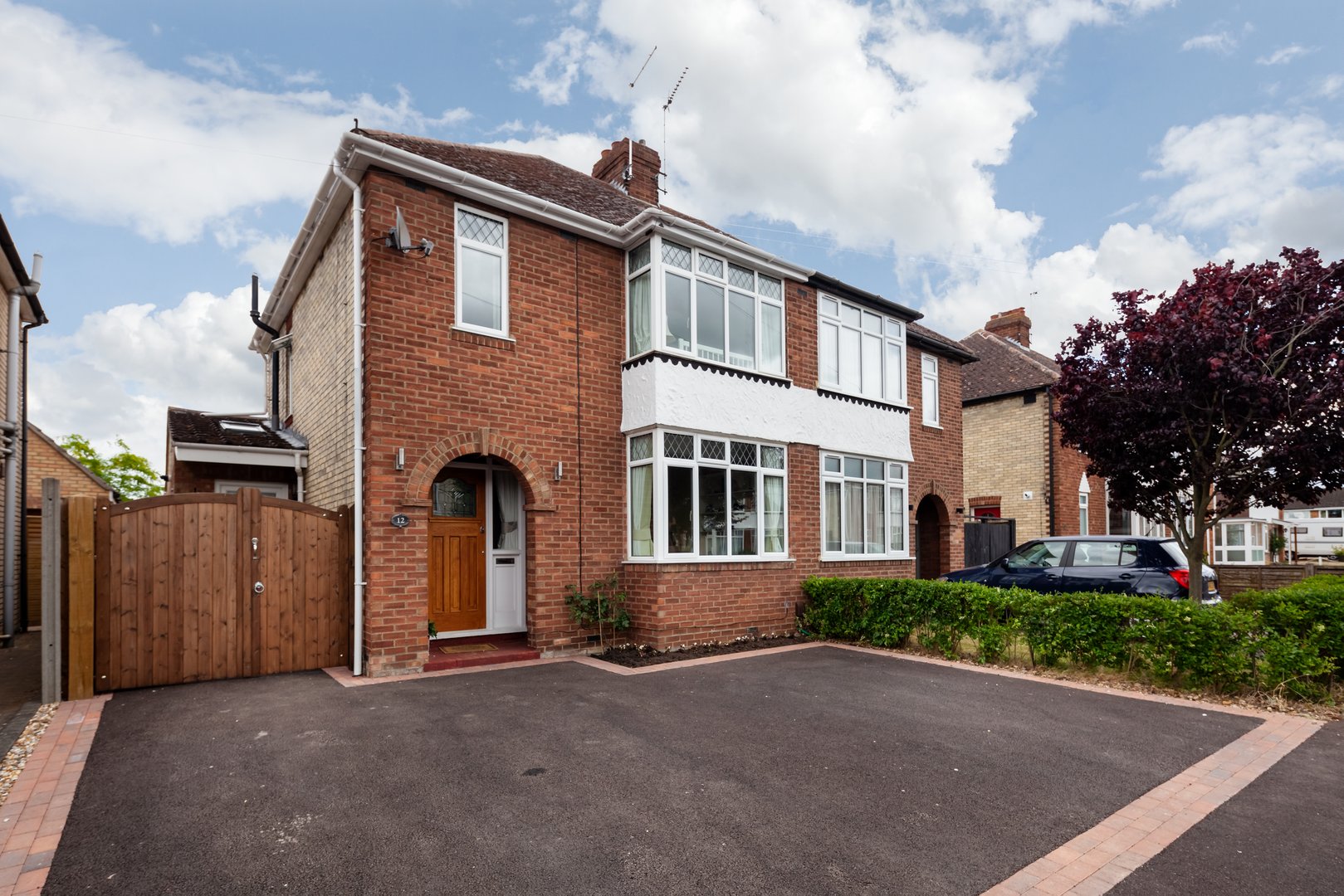 Semi detached house with tarmac driveway