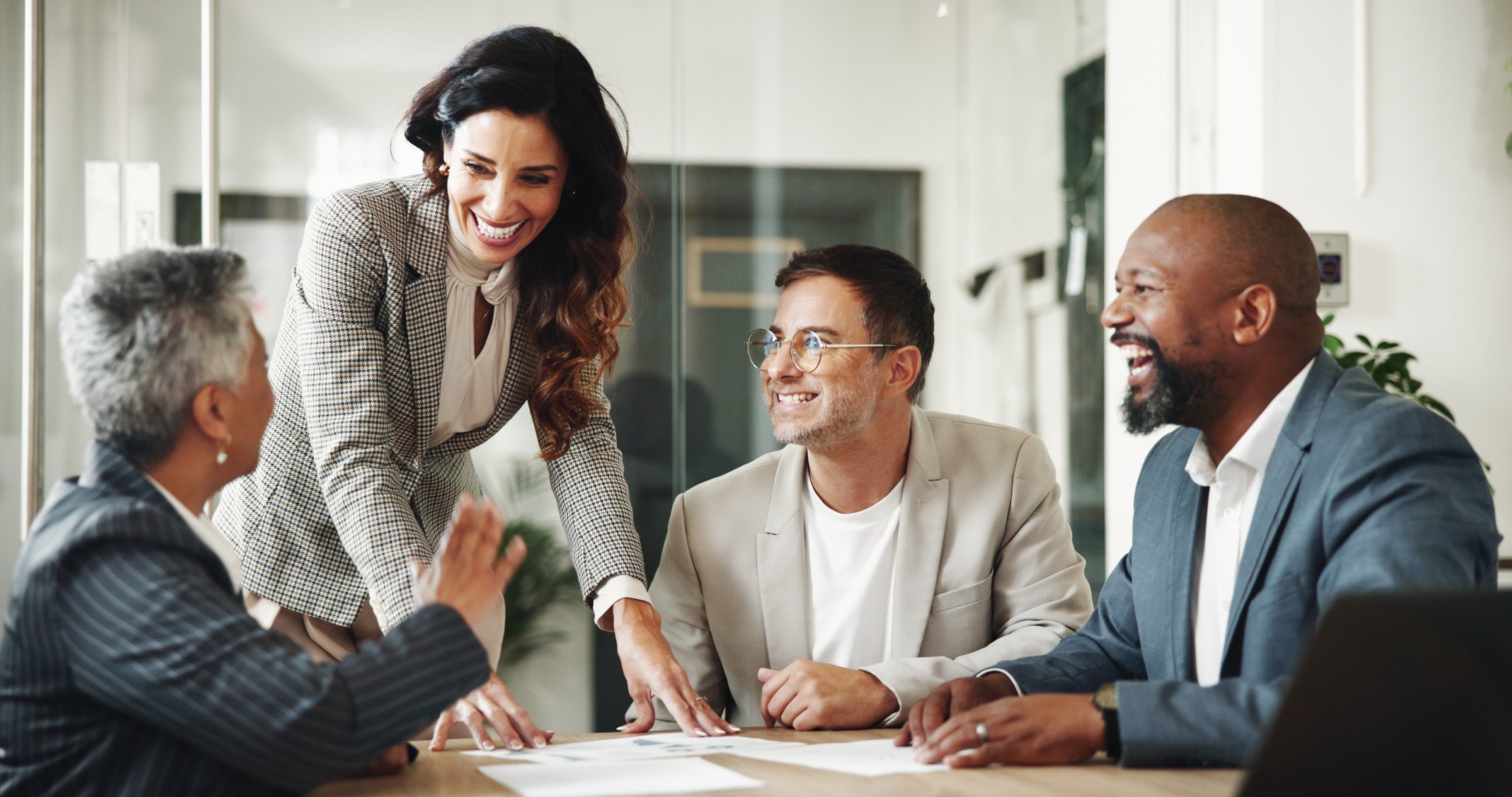 Meeting, documents and business people in office for finance investment with company with online. Collaboration, paperwork and financial management team with profit or revenue margin report.