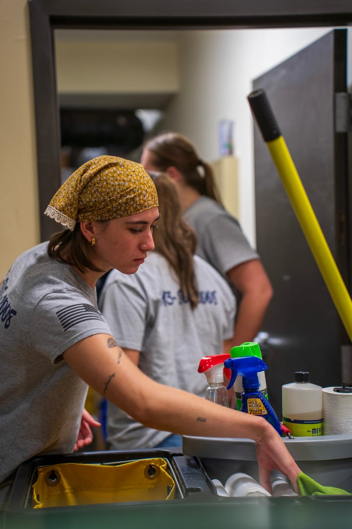 Professional cleaner in action providing quality cleaning service