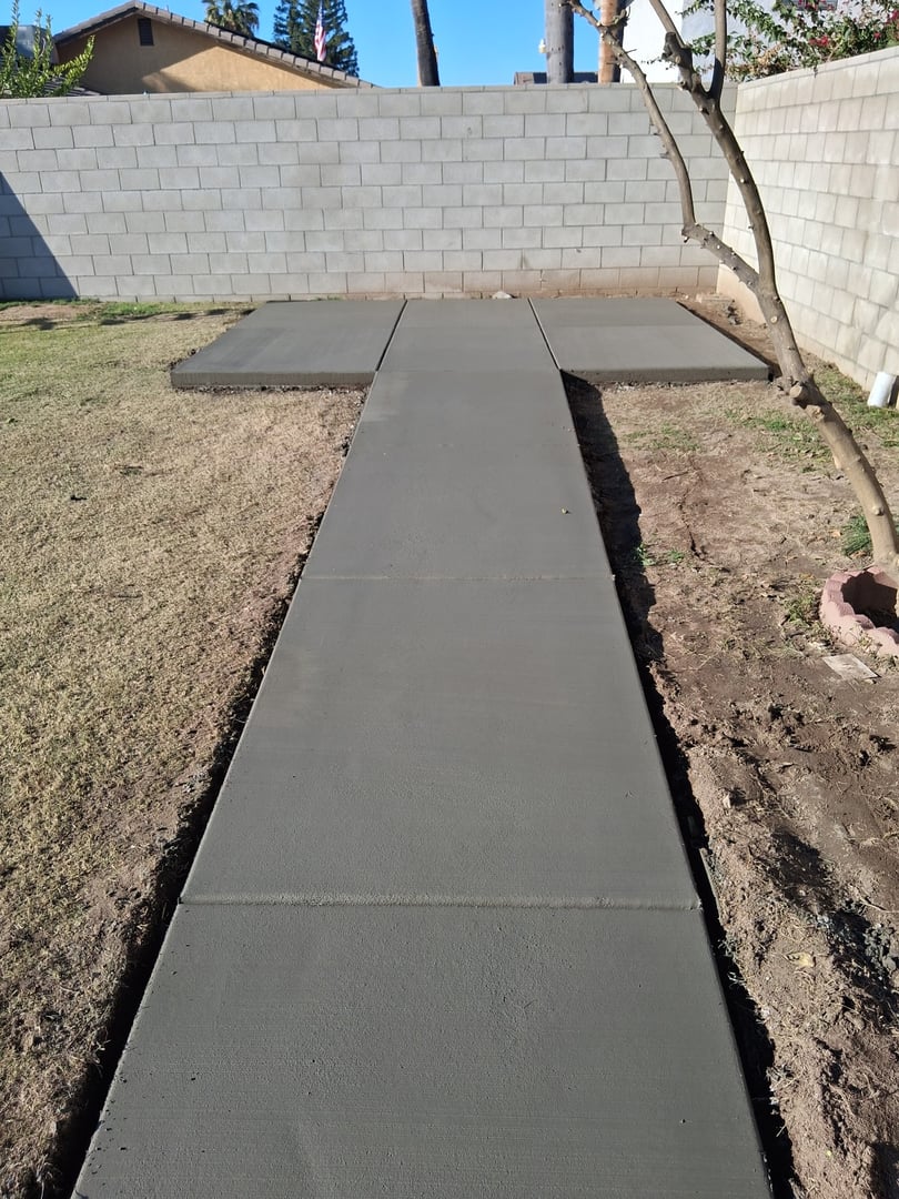 Concrete storage shed pad with walkway access in Bakersfield