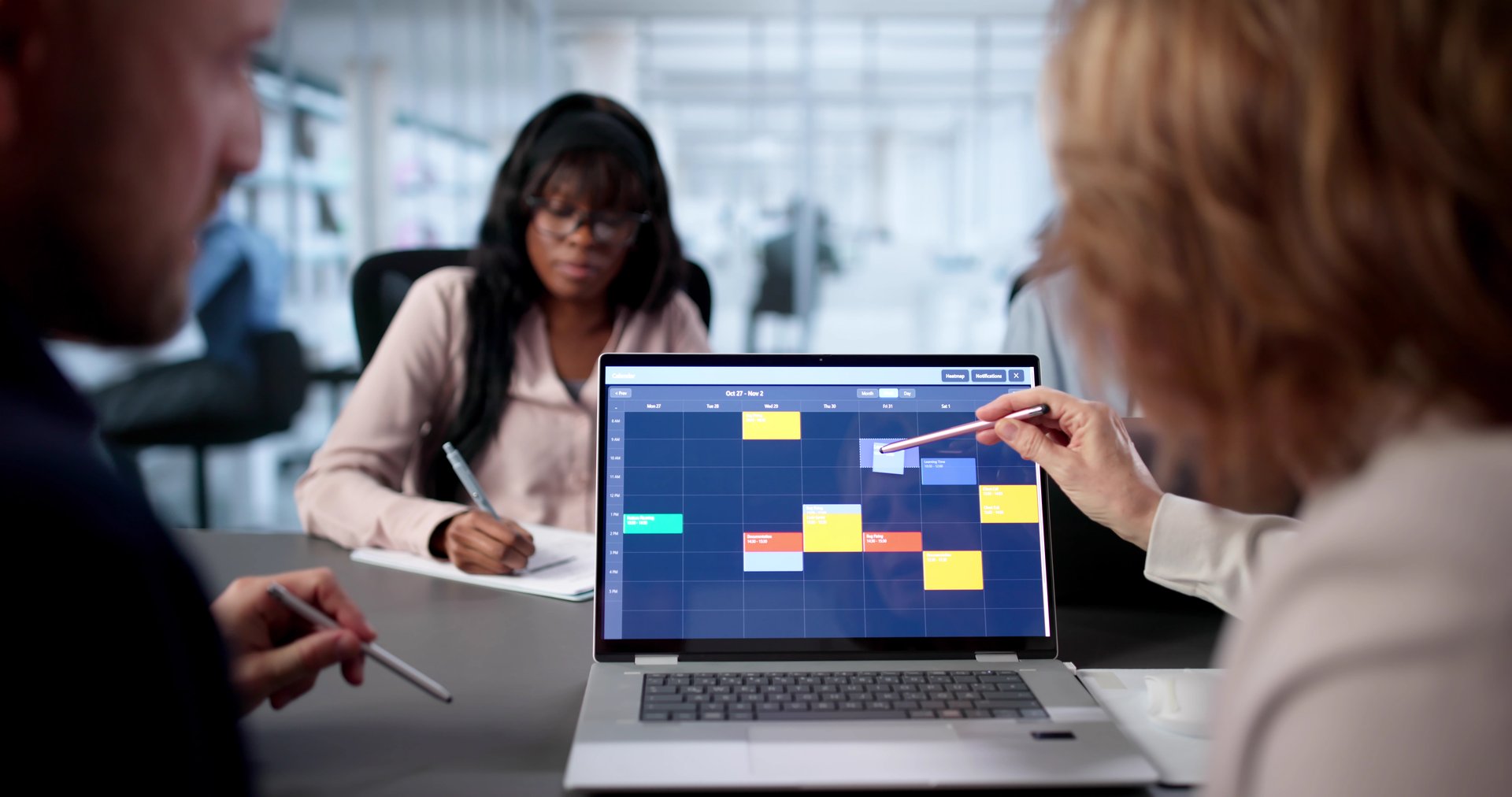 Team Of Diverse Professionals Scheduling Corporate Meeting On Virtual Calendar.