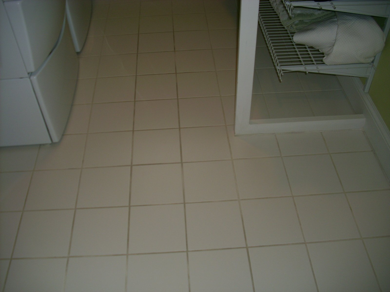 White ceramic tiles before grout restoration
