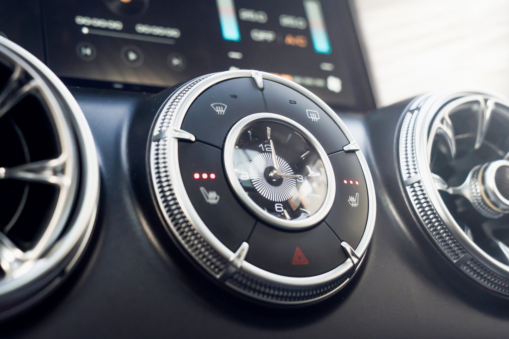 Closeup Car Analog Clock of a modern car dashboard, showcasing stylish ventilation and climate controls, blending function and design.