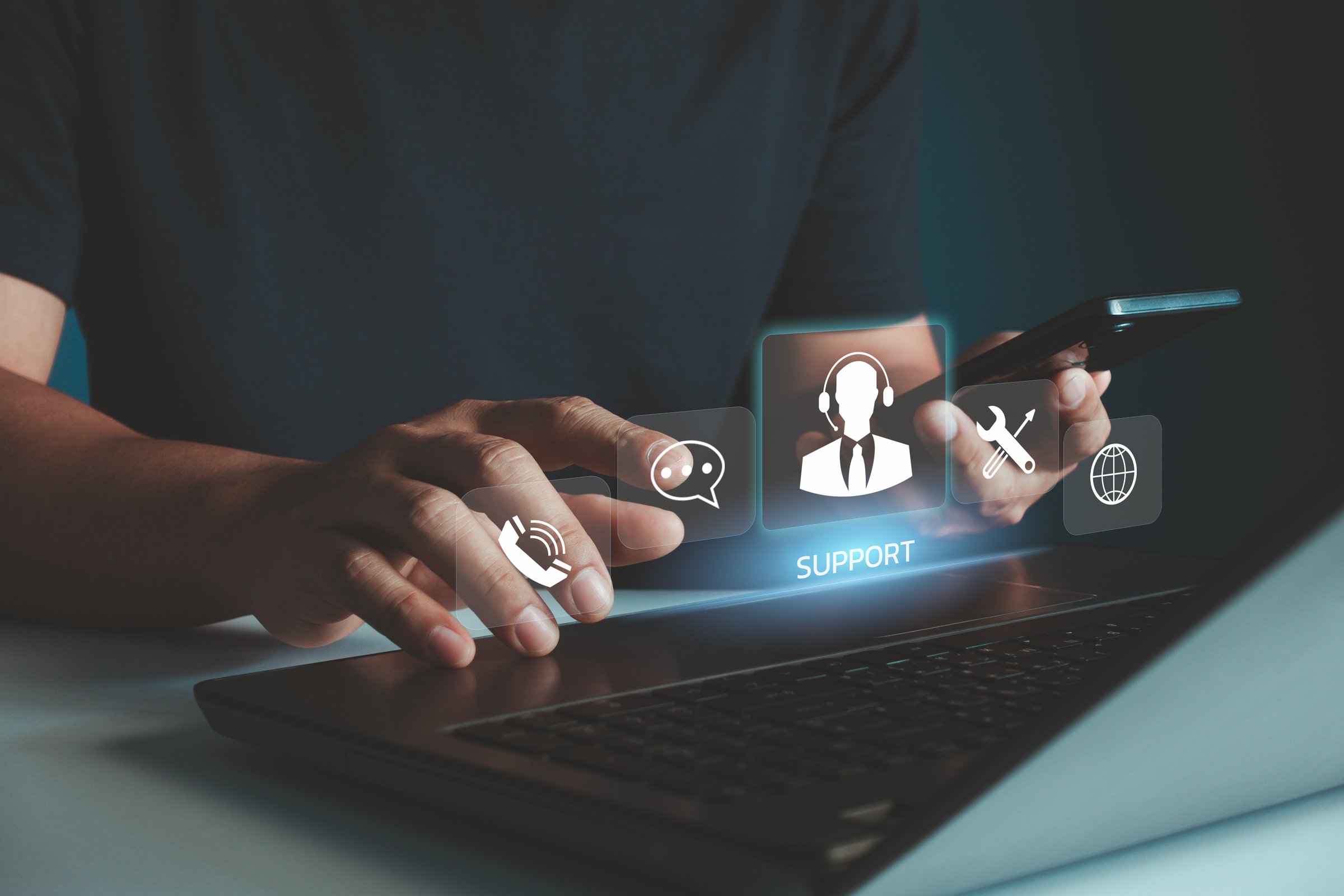 IT support, Technical support customer service concept, User hand using computer laptop with VR screen support customer icon, Technology internet concept, call center and customer service help 24 hrs.