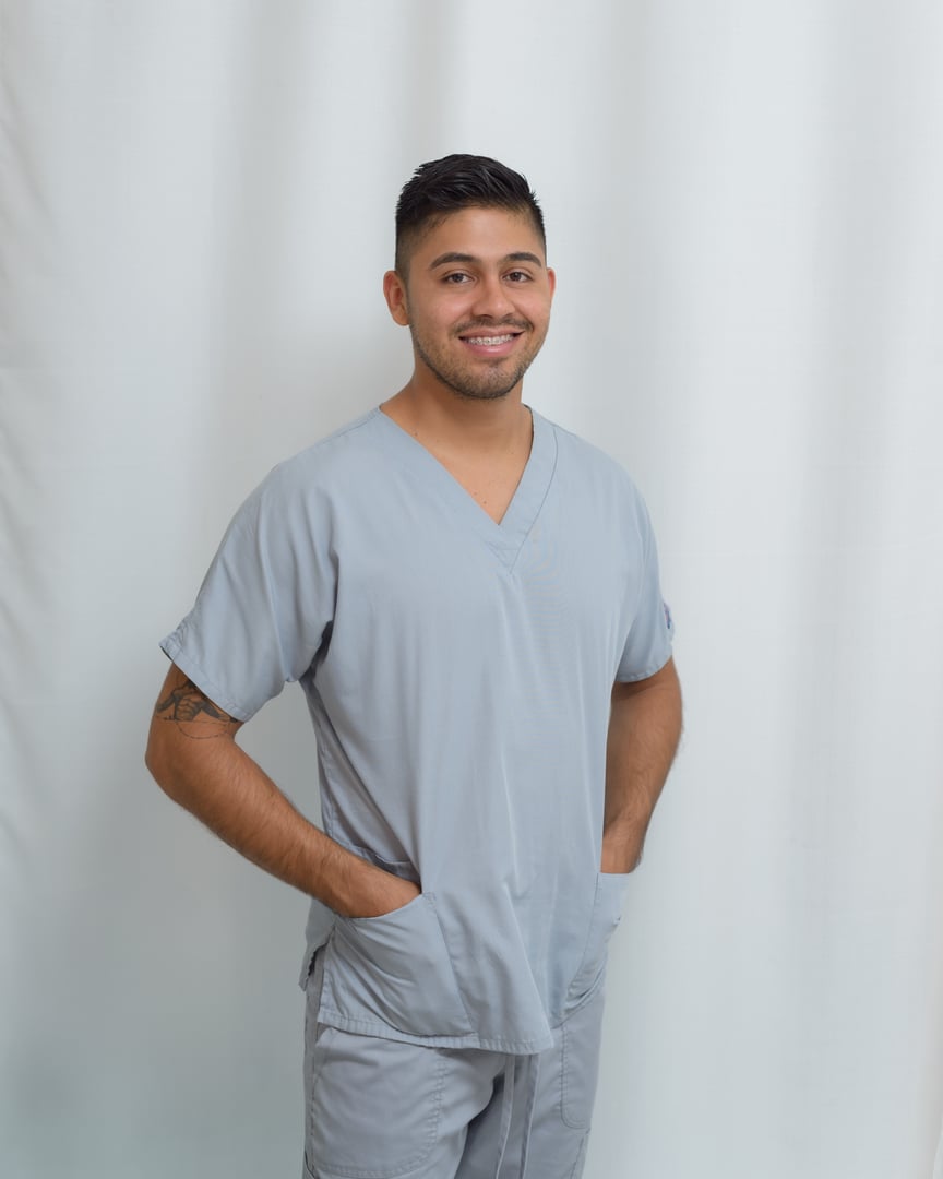 Medical nutritionist in uniform, smiling and looking at the camera.