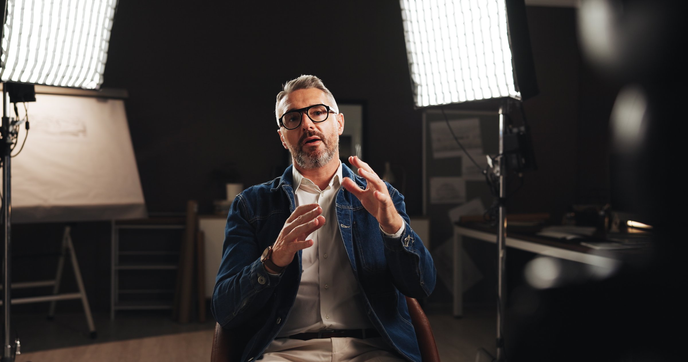 Mature man, discussion and screen with interview for talk, design tutorial or development process. Male person, civil engineer or building designer with recording for helpful tips, lesson or guide