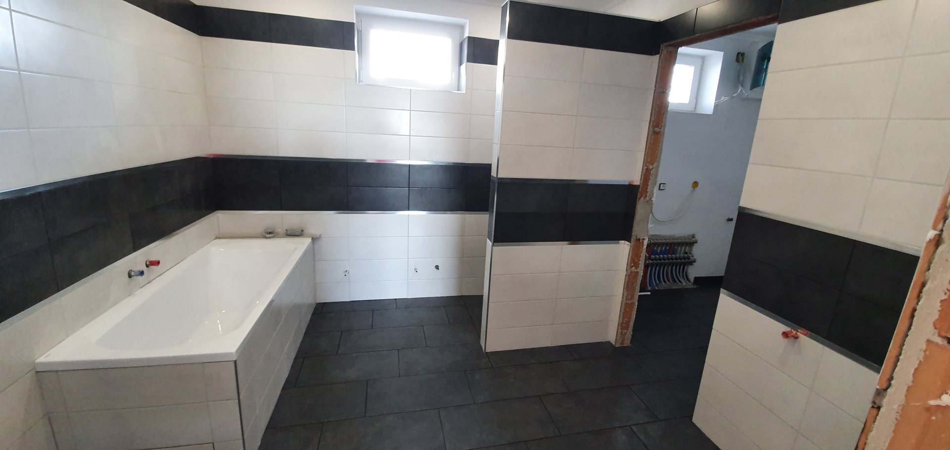 Tetőtéri fürdőszoba referencia