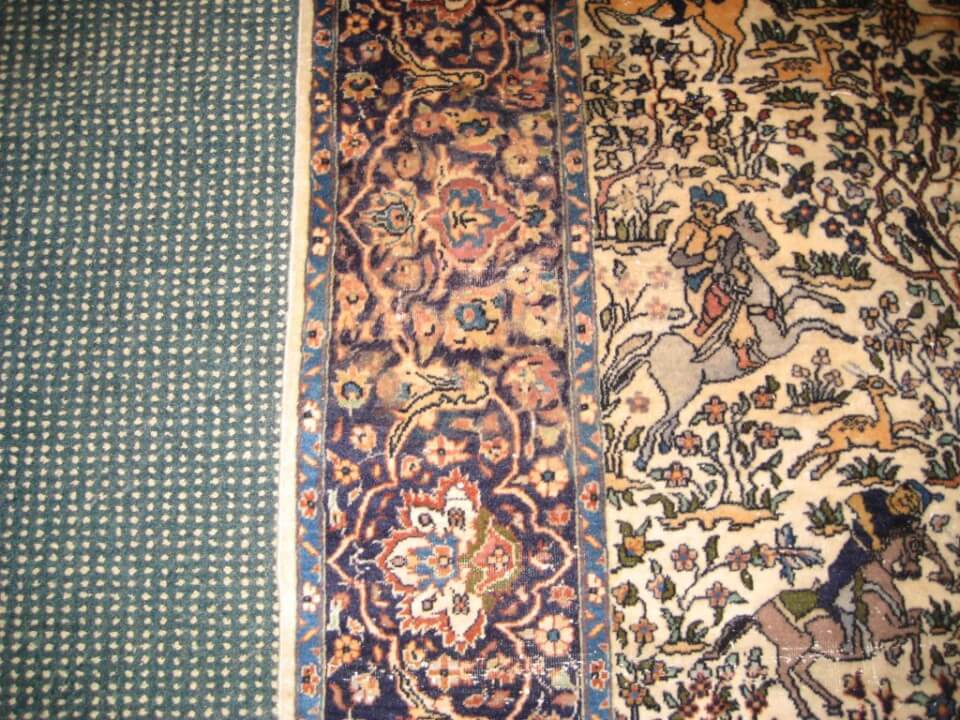 After: Professional rug wear repair with restored pattern and color uniformity