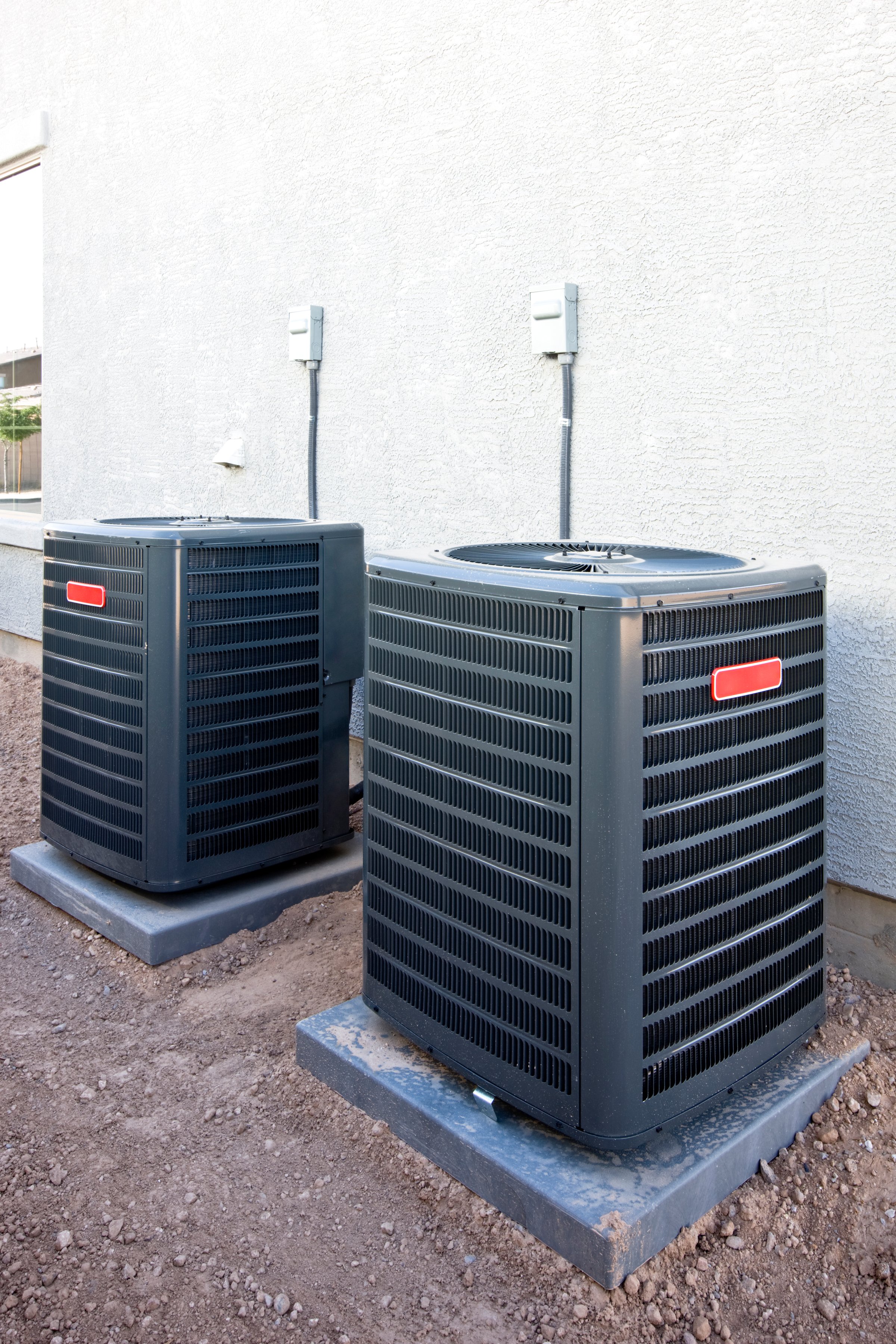 Two new AC units for a new house being built. High Resolution file shot on a Canon 1Ds Mark III.