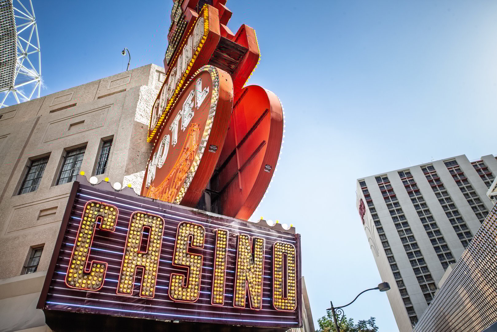 Las Vegas, August 21, 2024: Close-up of the iconic vintage neon signage at Golden Gate Hotel and Casino, situated prominently on Fremont Street in downtown Las Vegas. Celebrated as one of the city's oldest gambling venues, the hotel embodies classic Las Vegas charm, showcasing vibrant lighting and historic architecture that appeals to visitors seeking traditional Vegas entertainment.