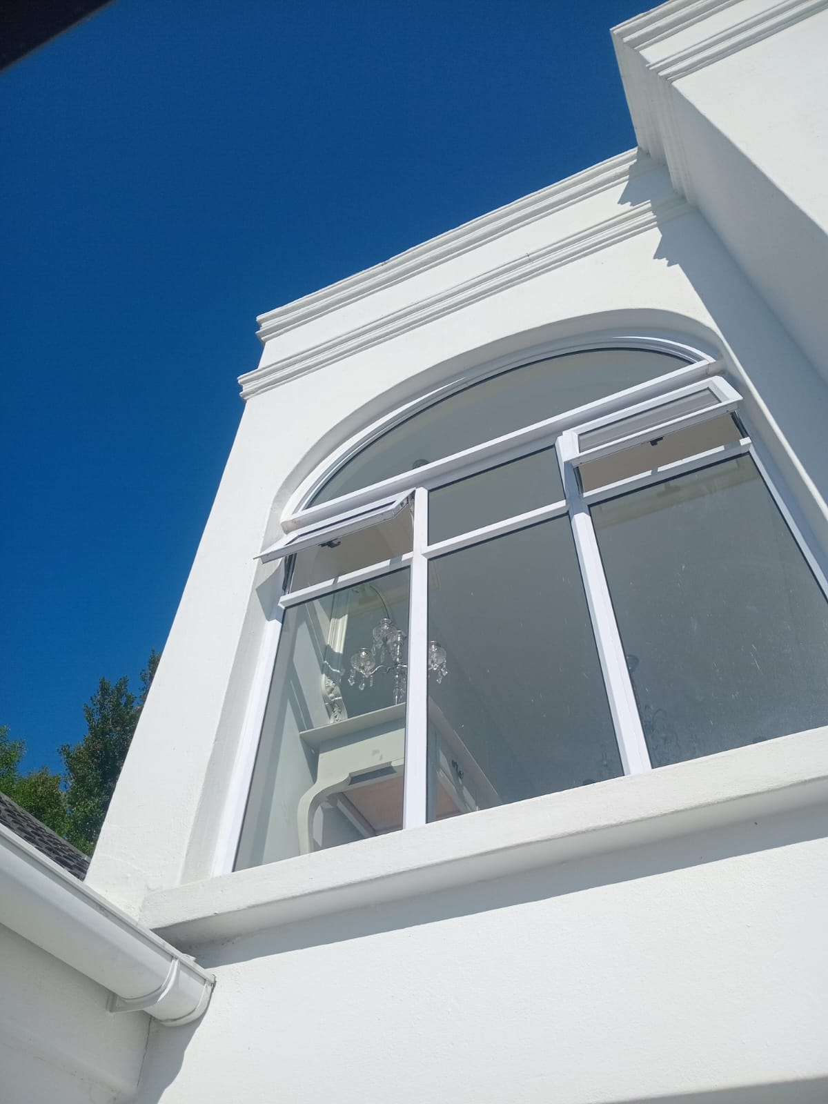 Custom arch with aluminium window installation