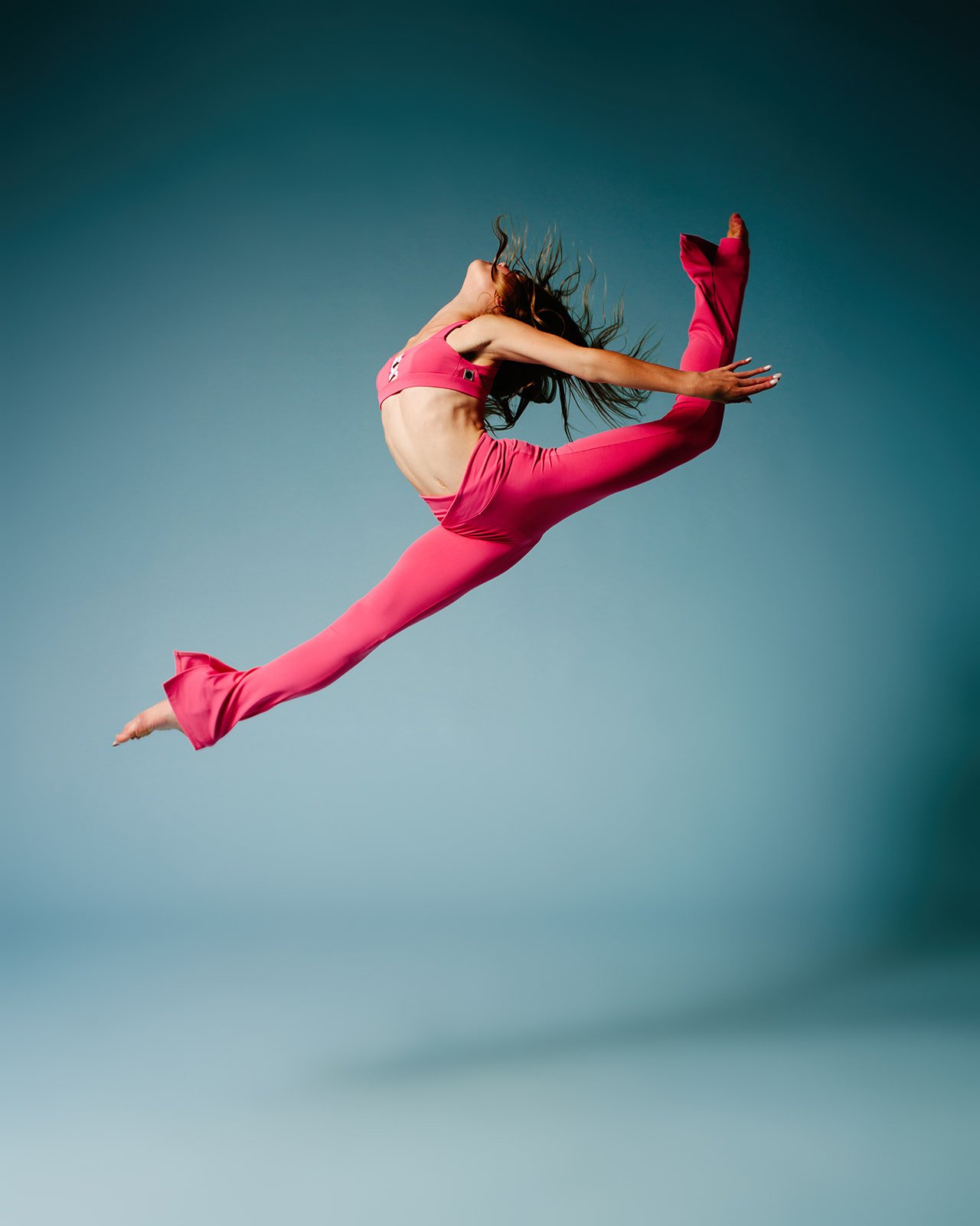 Professional dancer demonstrating leg extension technique
