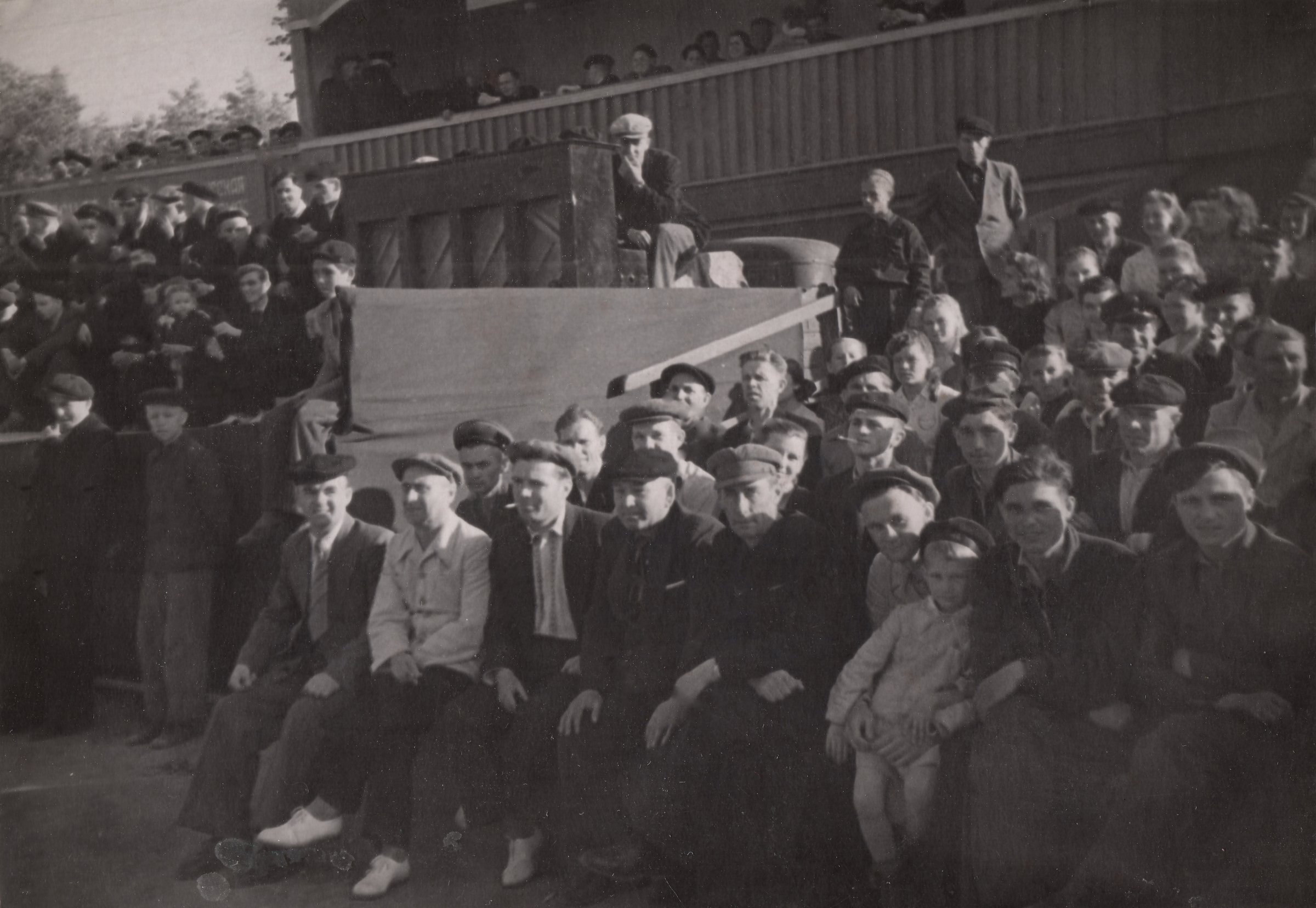 Chasov Yar, Ukraine - 05.20.1951: Spectators in the stands of the city football stadium.