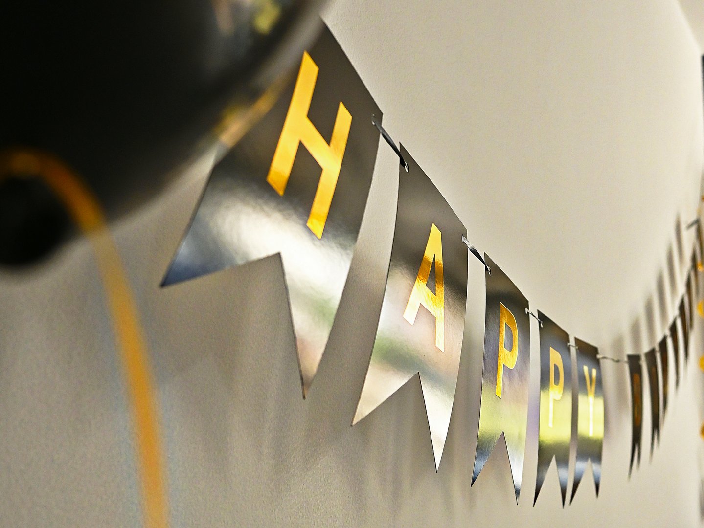Surprise party banner on wall