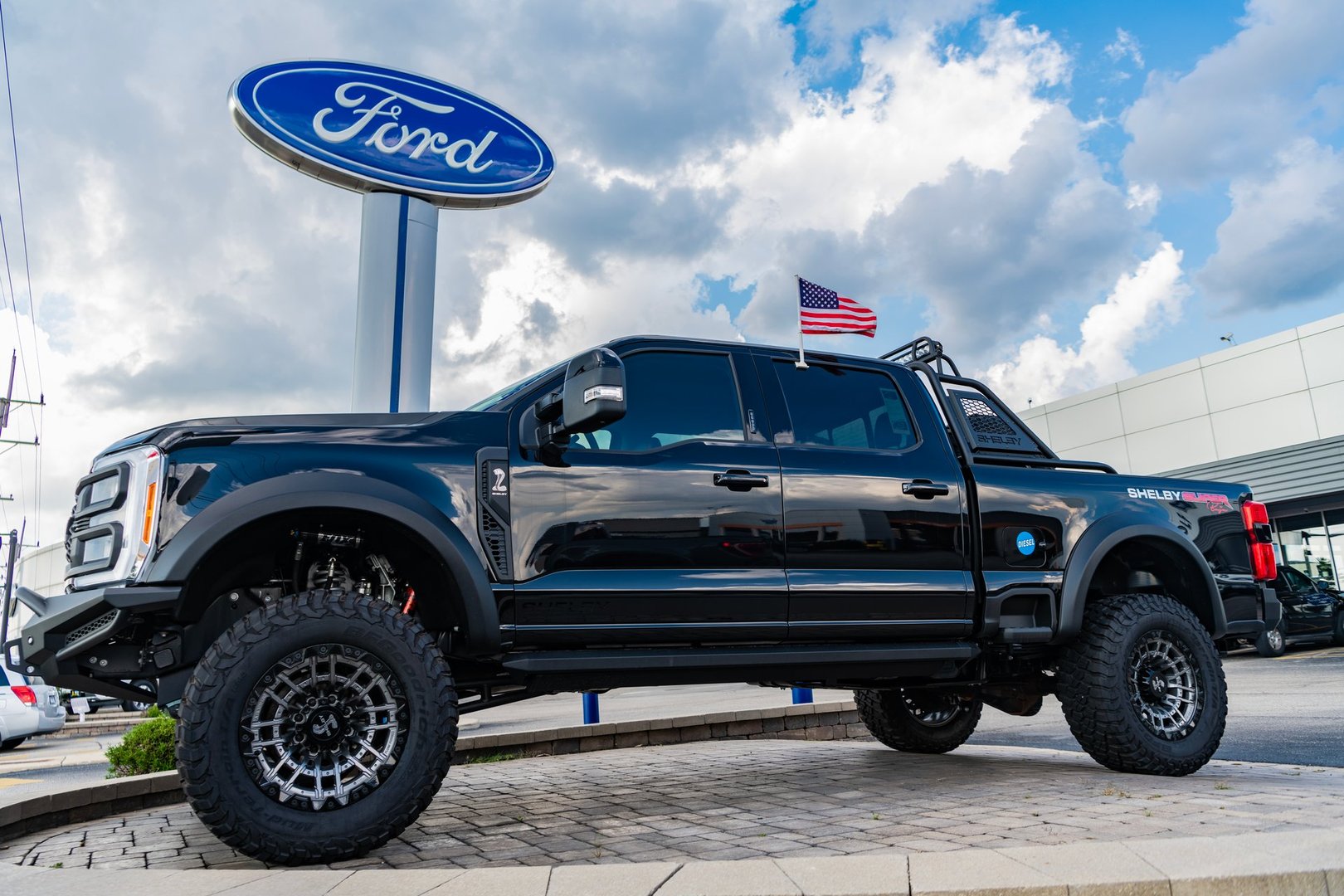 Park Ridge, Illinois, USA - August 17, 2024: Luxury car of Ford F-250 Harley Davidson logo. Car of Ford F-250 Harley Davidson parked outdoor, side view. 2023 Ford F-250 Harley Davidson.