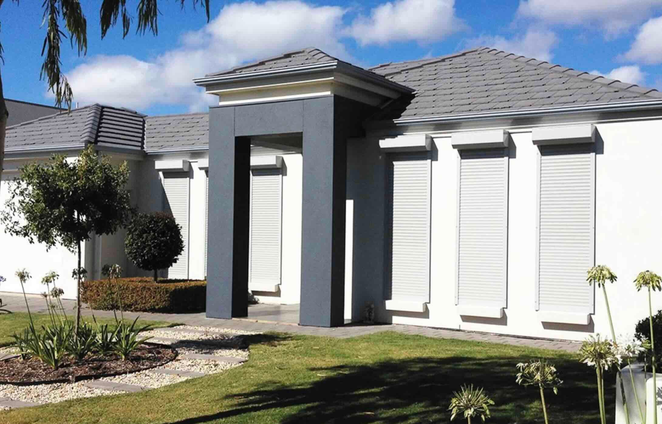 The back room has great light with views to the garden hedge.