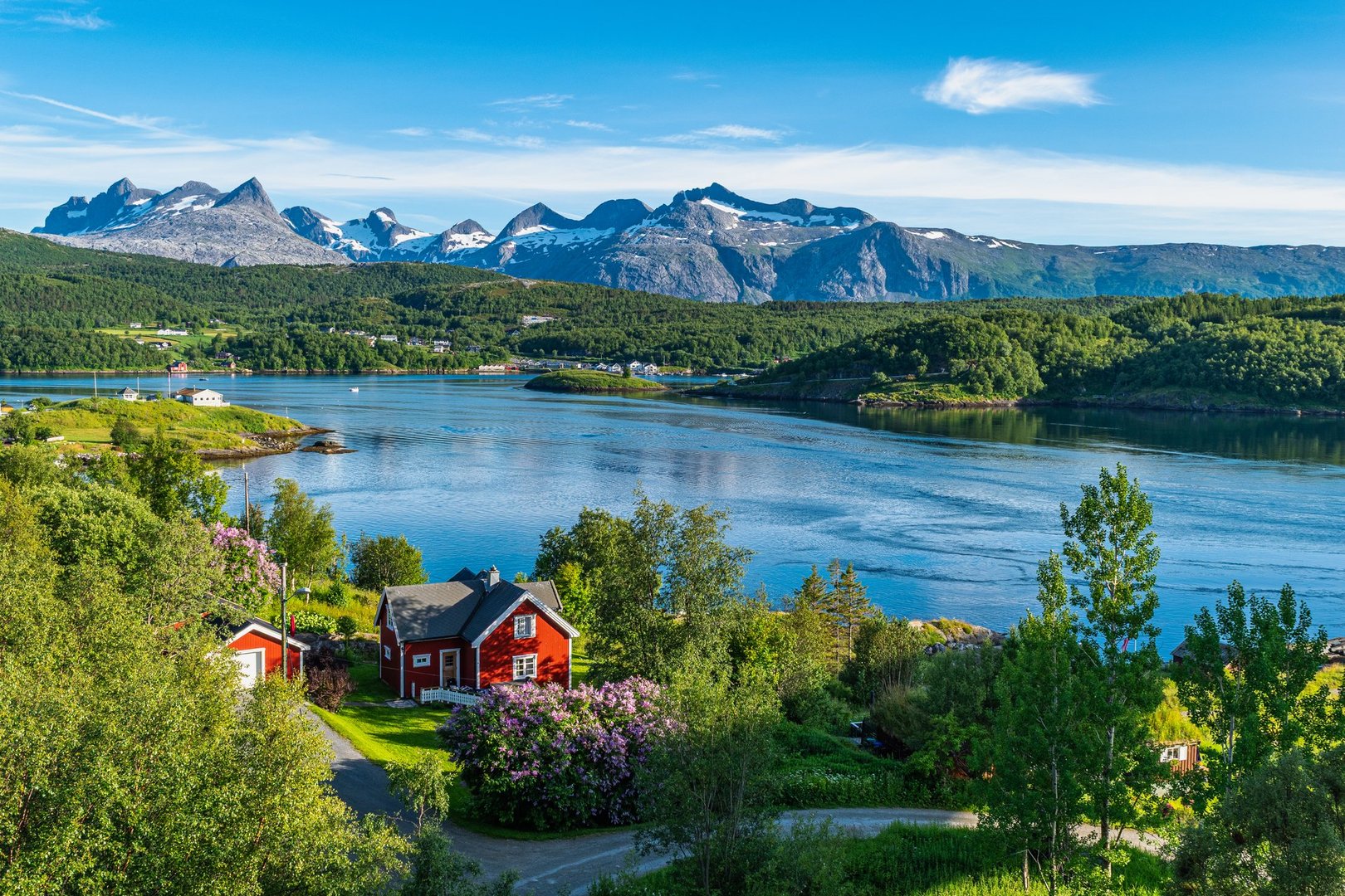 The village, nestled on the fjords, is the gateway to the Lofoten Islands.