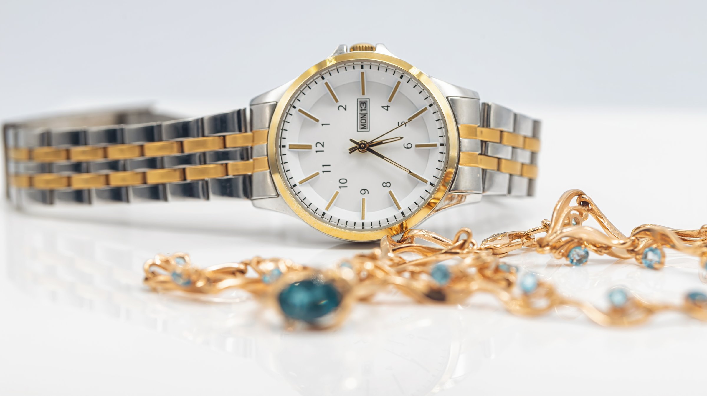 Gold ring with topaz, topaz necklace and original gold-plated wristwatch