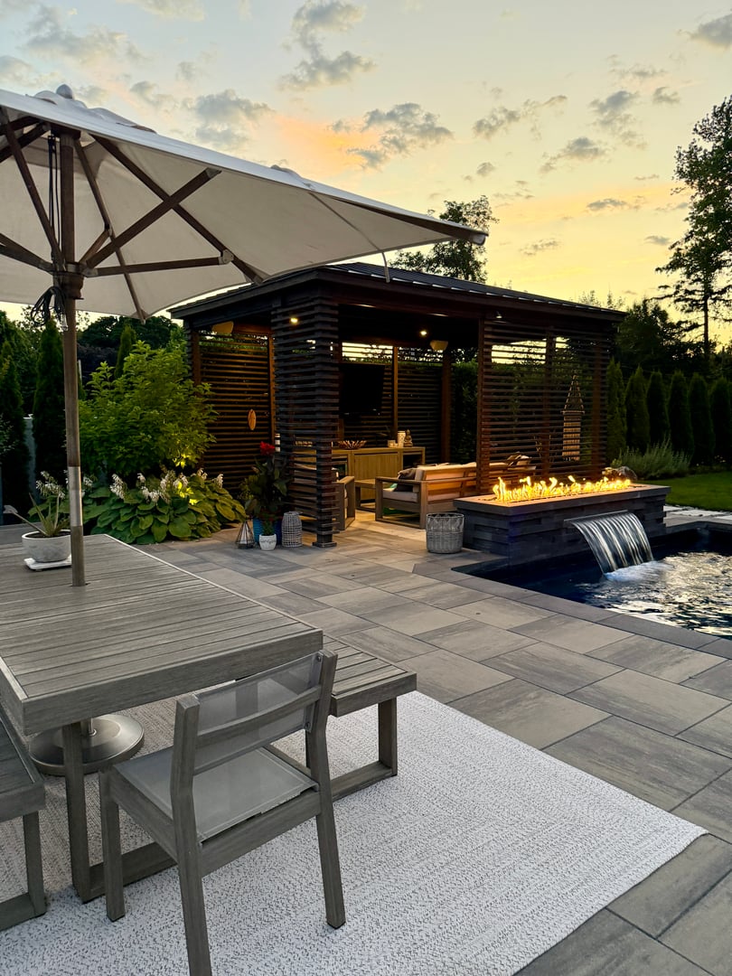 watch tv, dine and drink cocktails by the firepit above a swimming pool with LED lights