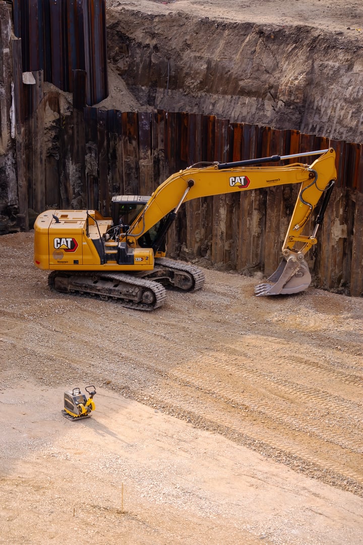 Medium Hydraulic Excavator CAT (Caterpillar) 330 GC and its offspring at construction site, 12.07.2023 Subotica, Serbia