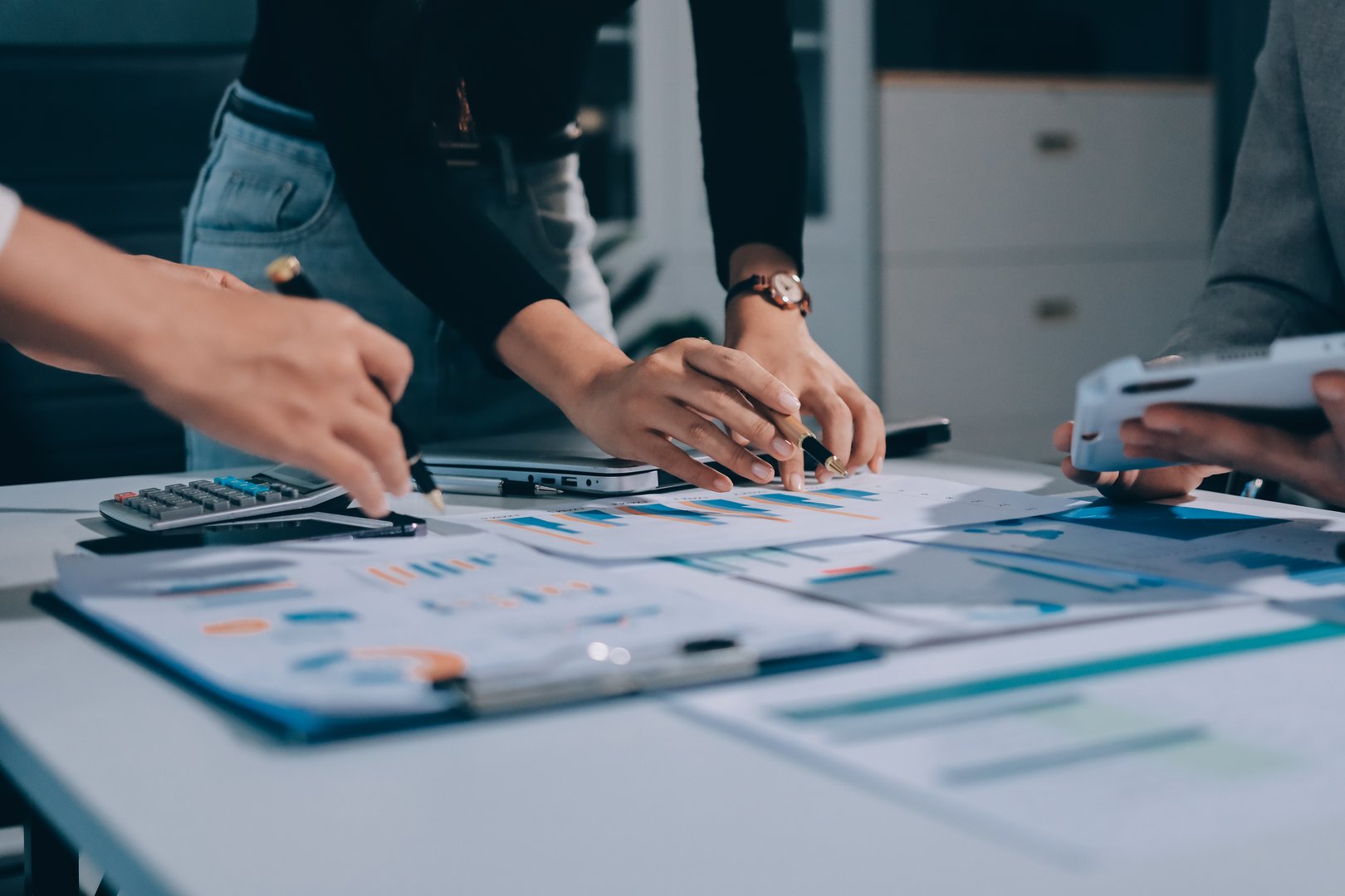 Accounting company provide finance and taxation planning for profitable cash flow, Auditor and accountant team working in office, analyze financial data and accounting record with calculator.Insight