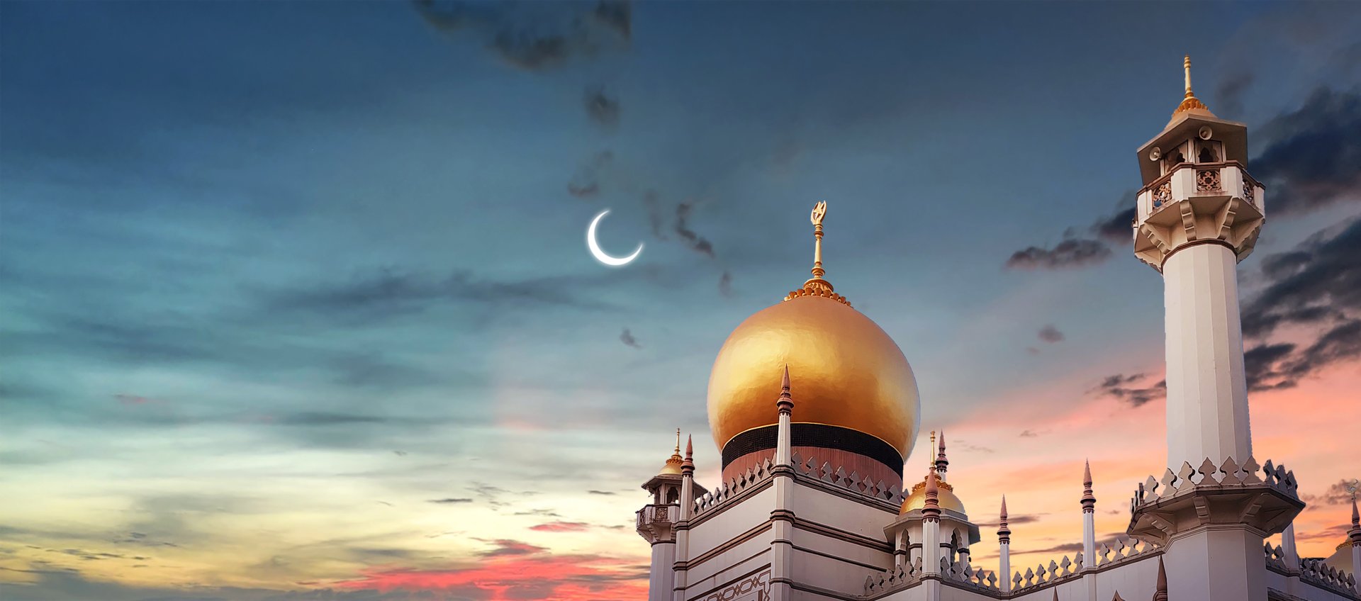 Islamic Mosque sunset dramatic sky, crescent moon, holy night. Islamic night and mosque wallpaper. Ramadan or Eid Islamic night sunset with eastern crescent moon.
