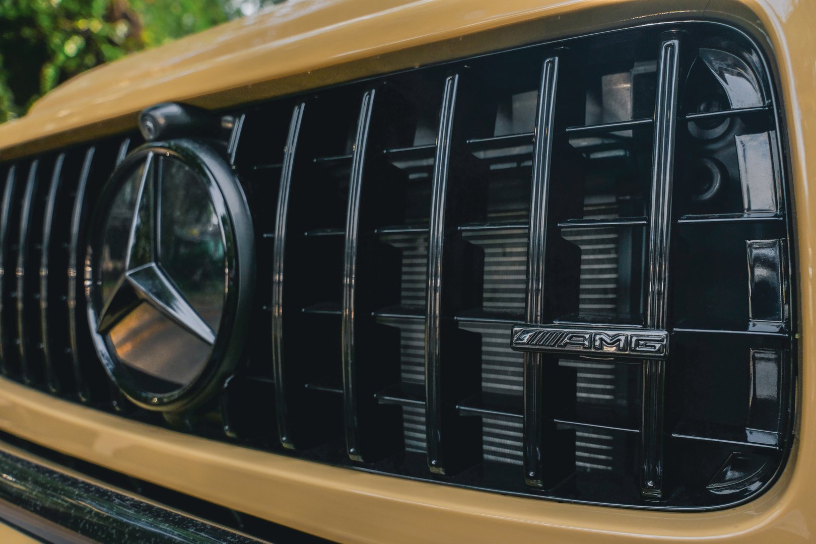 Almaty, Kazakhstan - July 15, 2025: AMG emblem on the front of the Mercedes-Benz G-Class. German car manufacturer