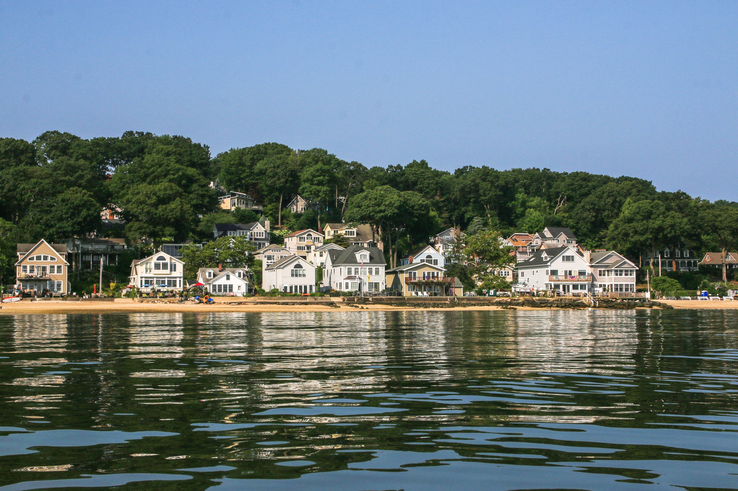 Looking at fleets cove in the presidents section from the water of Centerport Harbor.