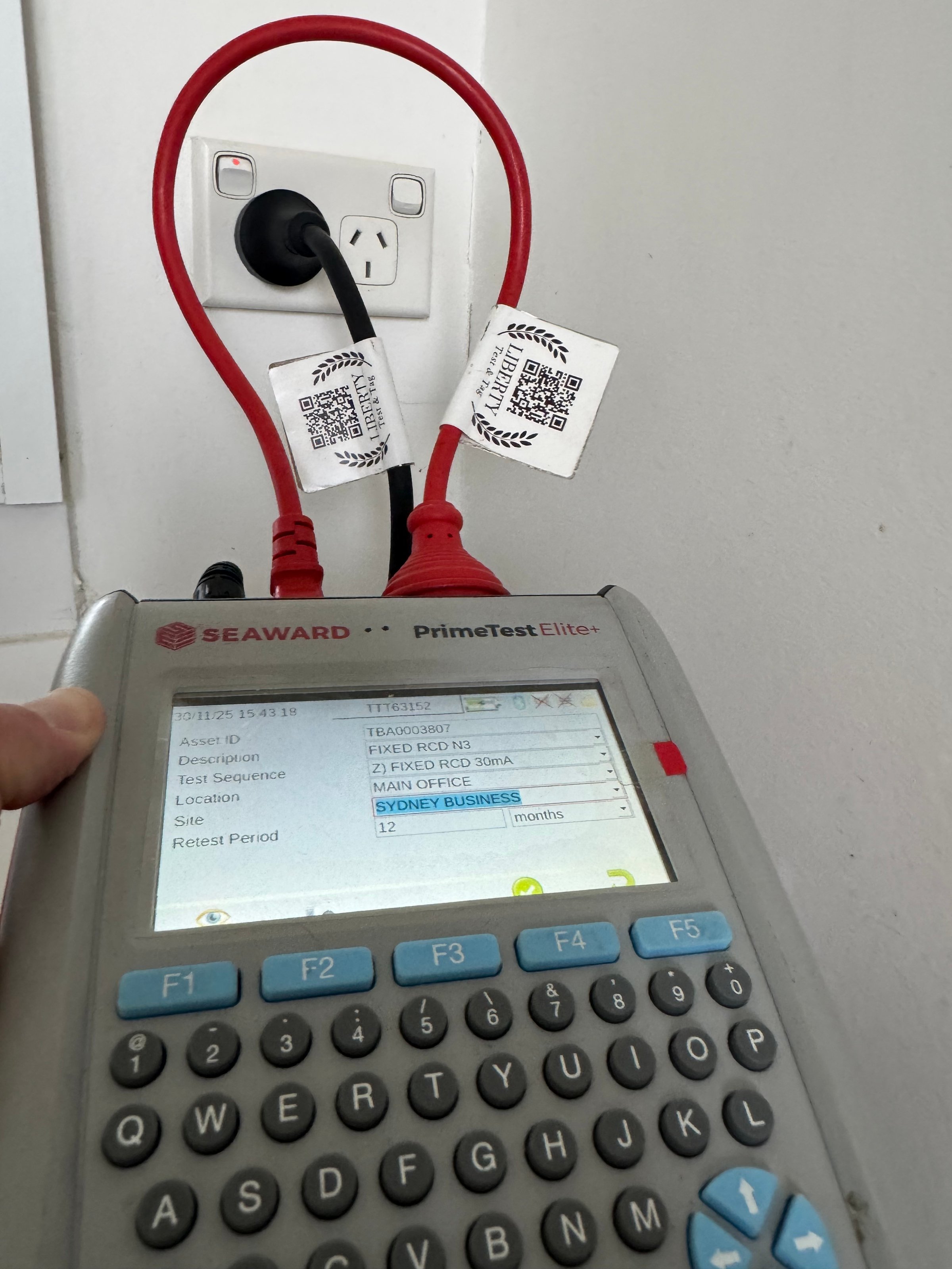 RCD testing Sydney - PrimeTest Elite+ tester with compliance tags