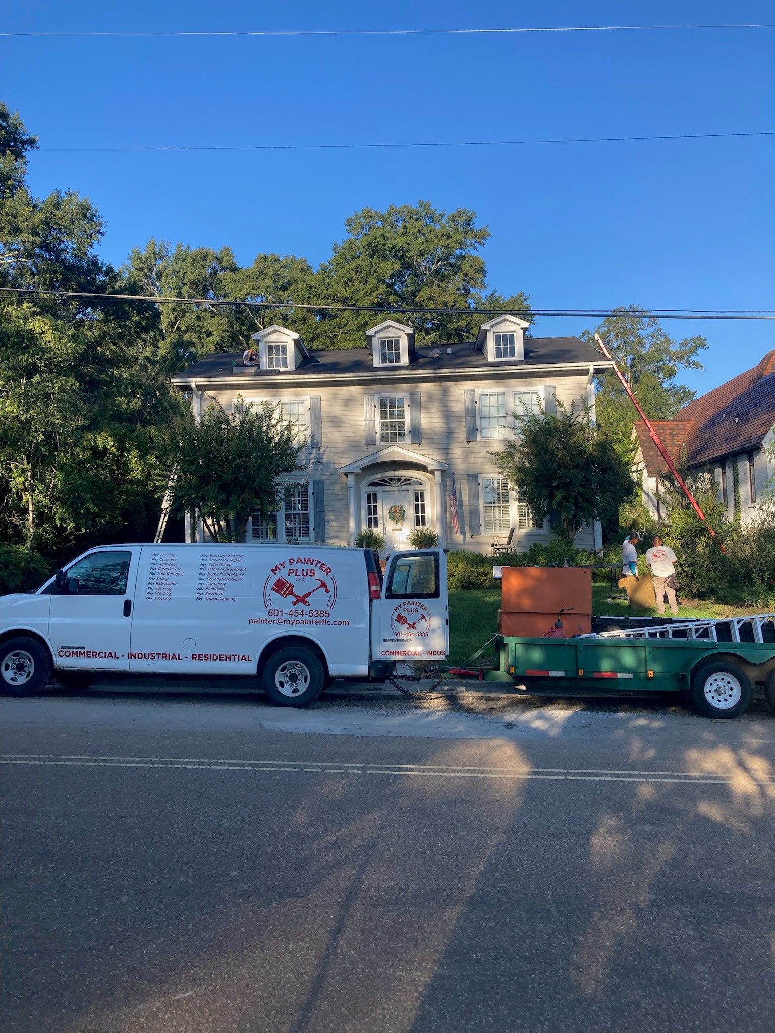 Professional painting contractor working on interior wall Jackson Mississippi