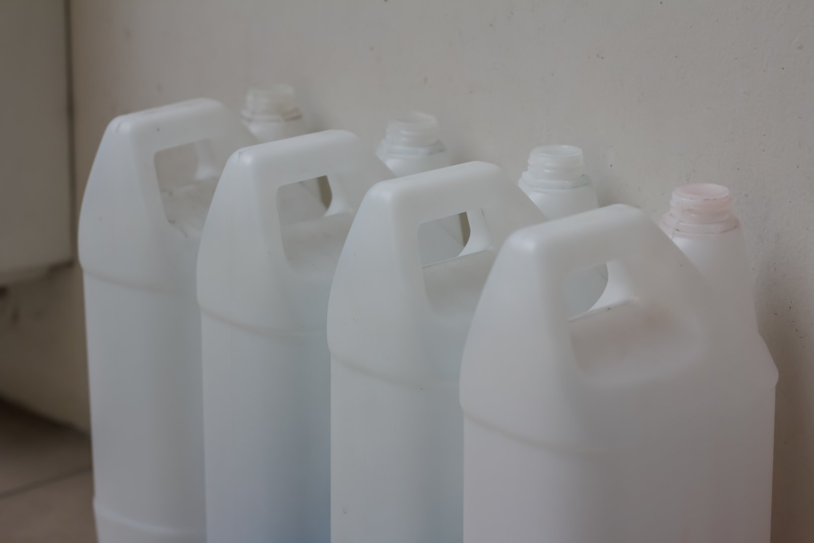 Empty plastic gallon bottles for storage