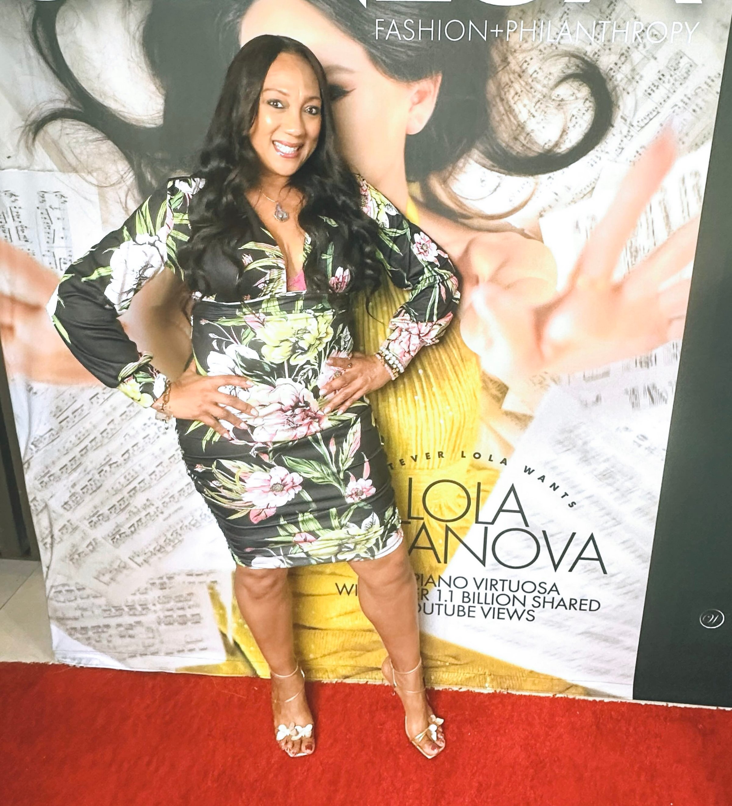 Lela Christine in professional floral dress - brand strategist and implementor