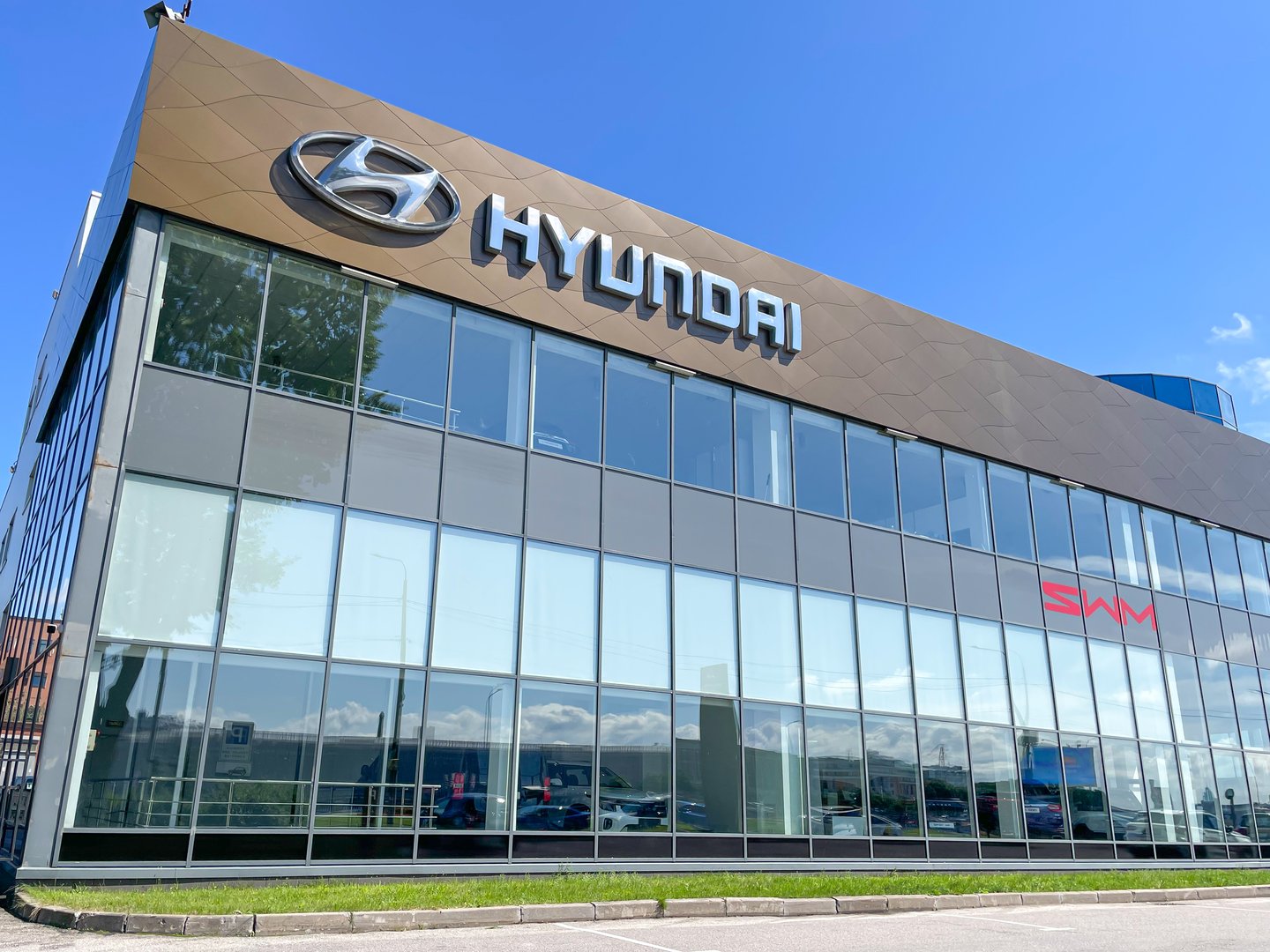 Facade of Hyundai car store. The frontage of the Hyundai Car Showroom. The Hyundai Motor Company is a South Korean automotive manufacturer. Korean cars.