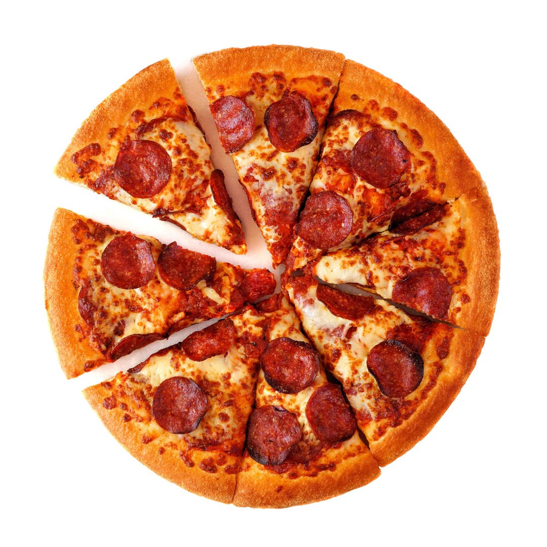 Classic pepperoni pizza with cut slices isolated on a white background