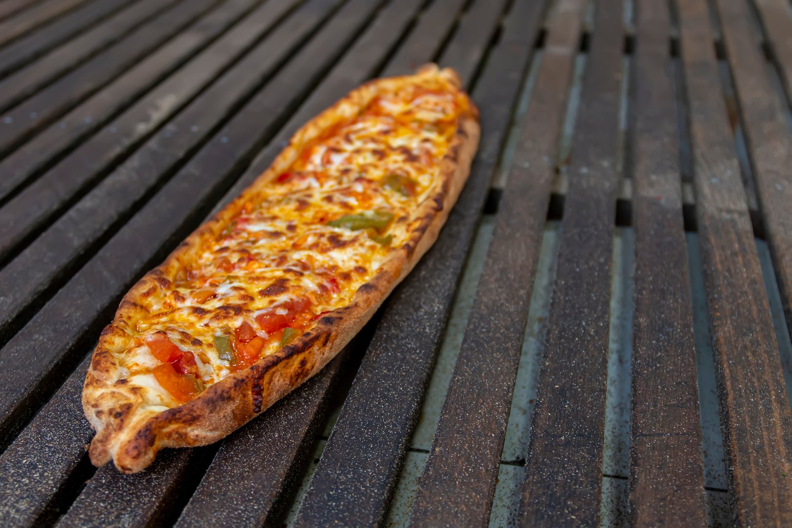Traditional turkish pizza, pida is roasted in a wood-fired oven.