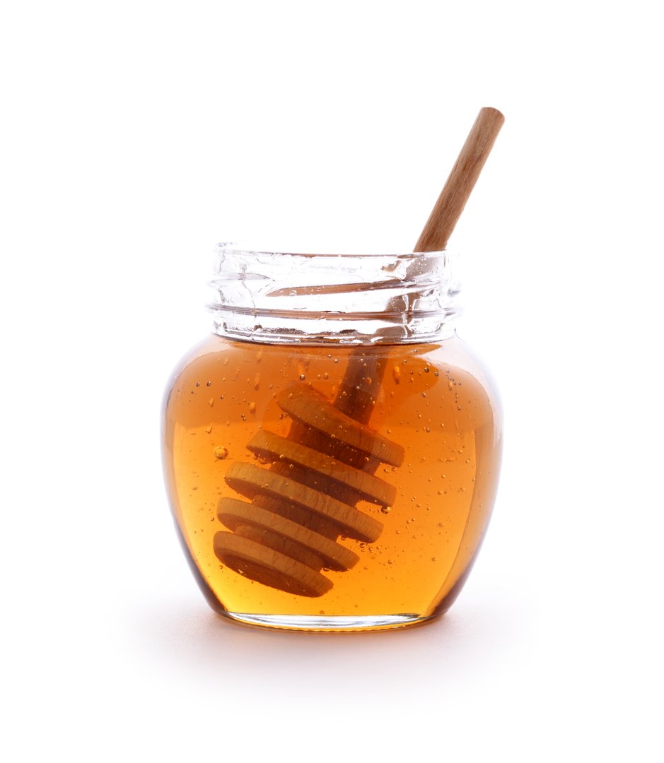 Golden natural honey in jar
