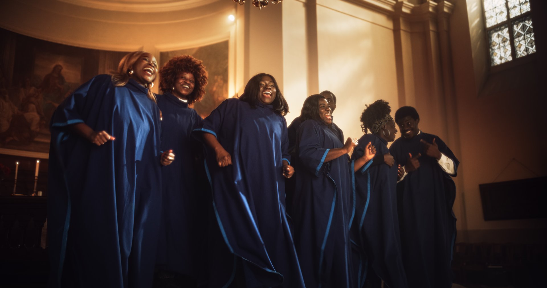 Black Christian Gospel Singers in Church Clapping and Stomping, Praising Lord Jesus Christ. Song Spreads Harmony Joy and Faith. Energetic Choir Sharing the Message of Christianity with Uplifting Music