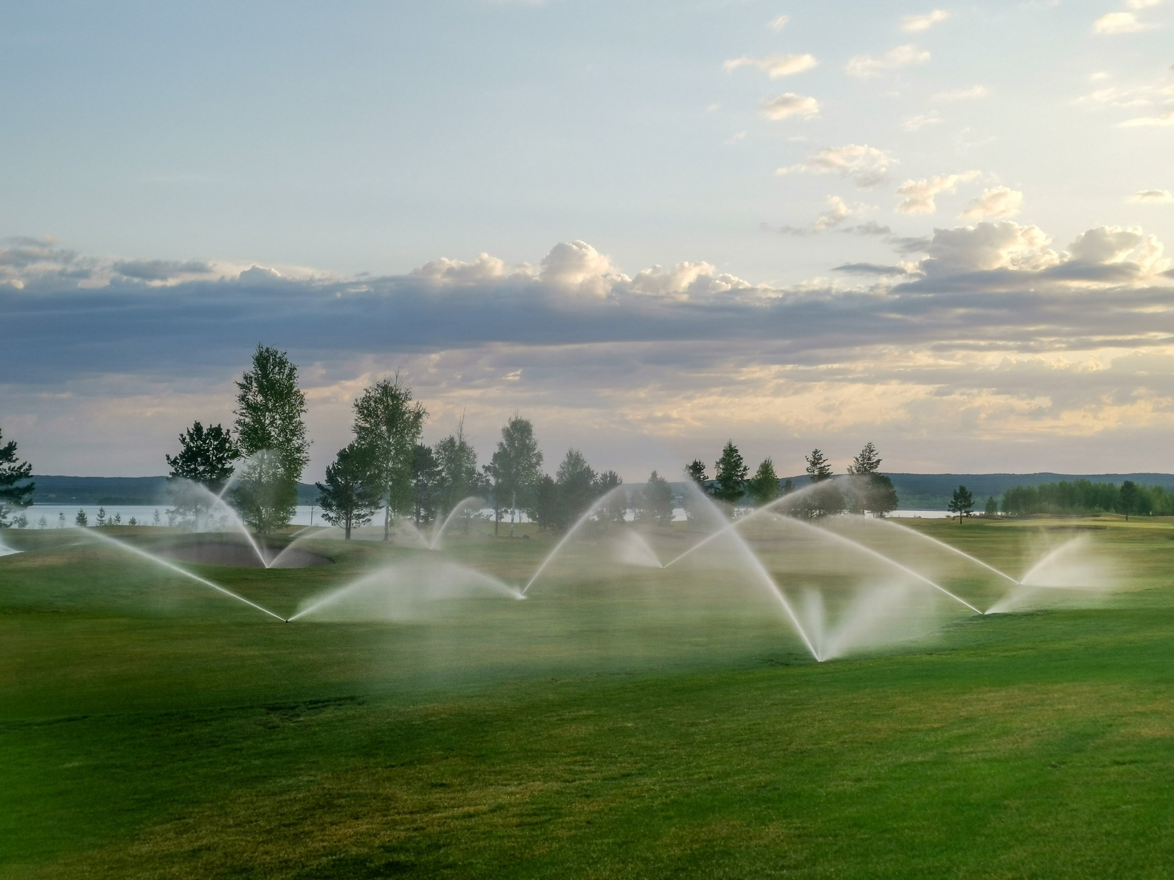 Irrigation sprinklers on golf course