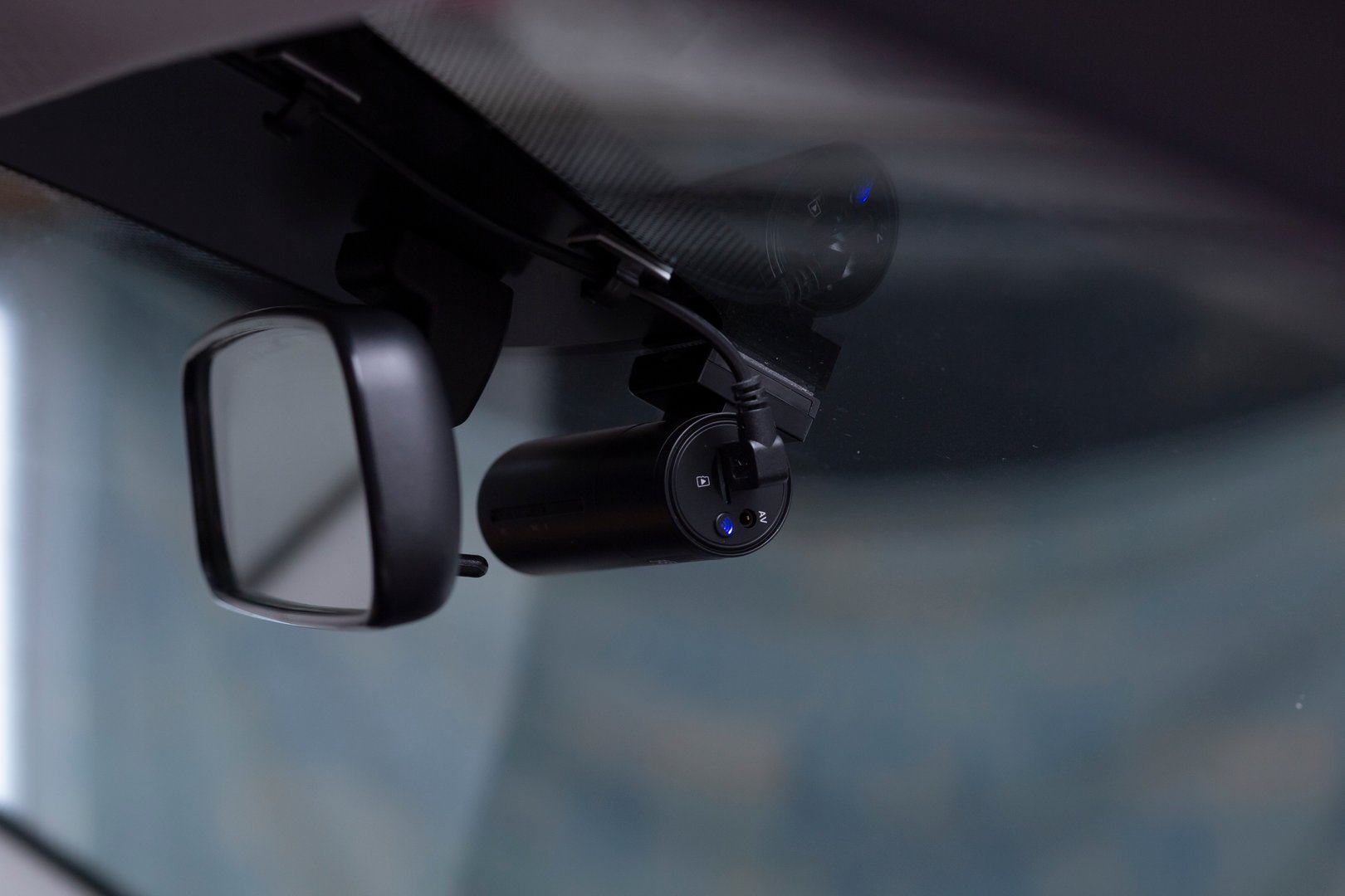 DVR for the car.Installing the DVR in the car.