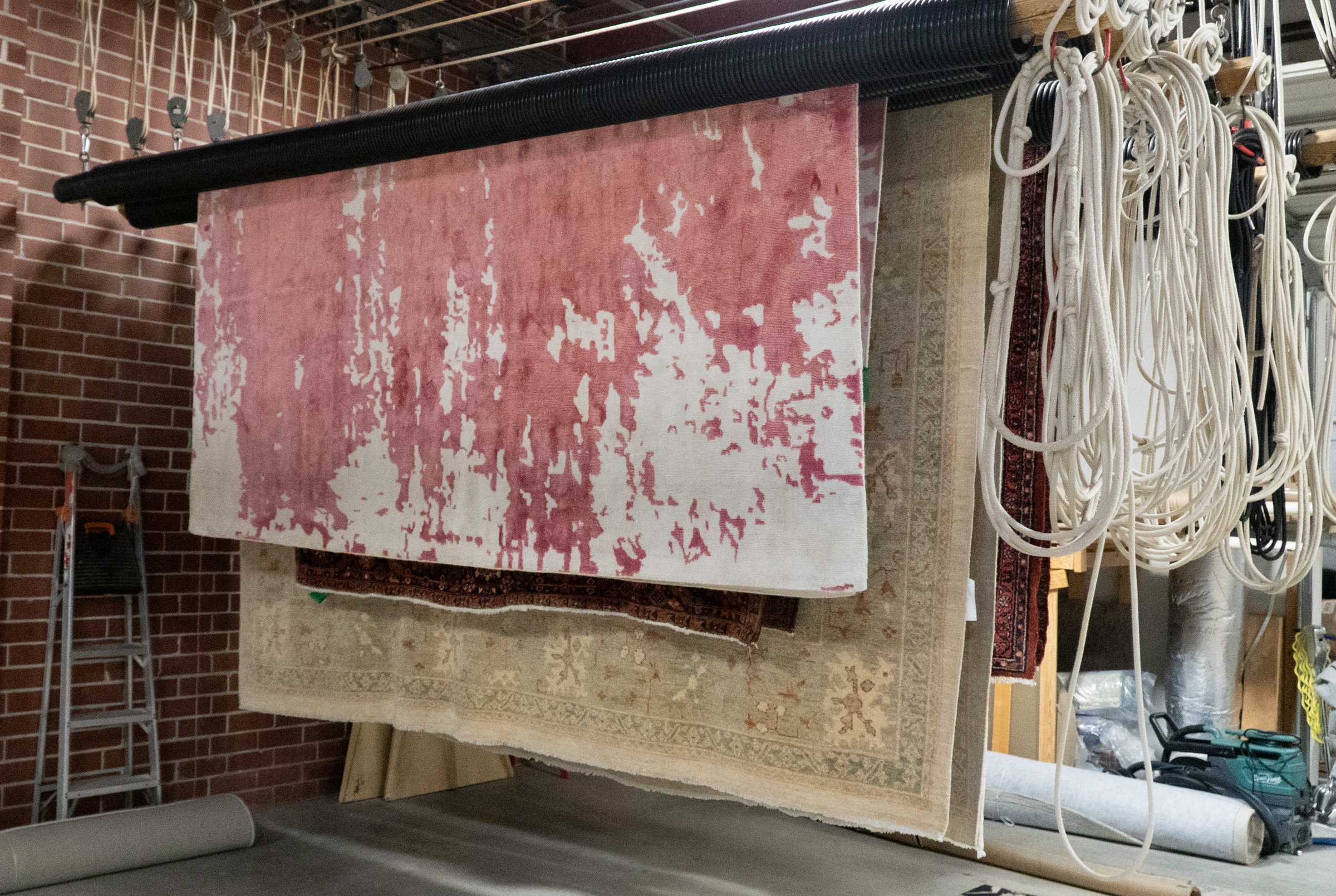 Rugs drying in climate-controlled environment