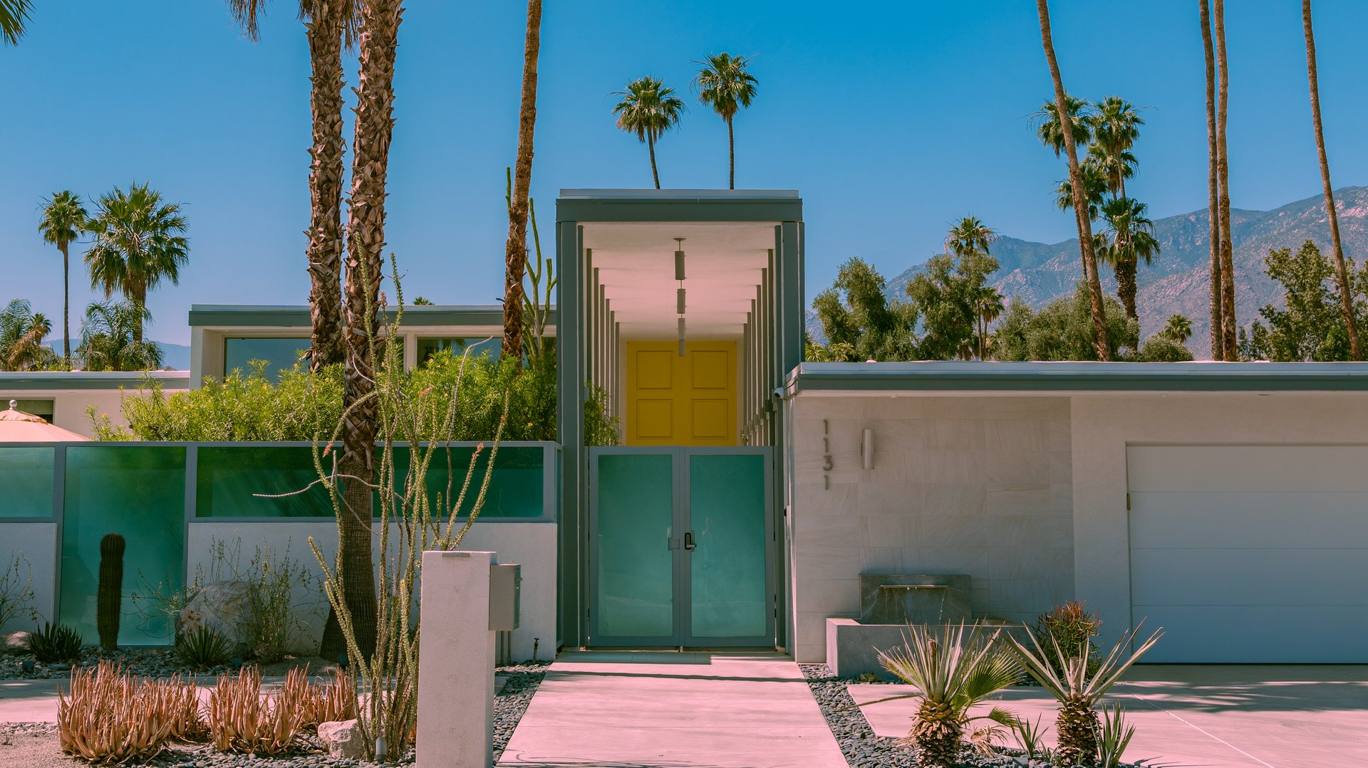 Palm Springs, CA, US-May 22, 2024: Exterior of mid-century modern luxury house in suburban neighborhood.